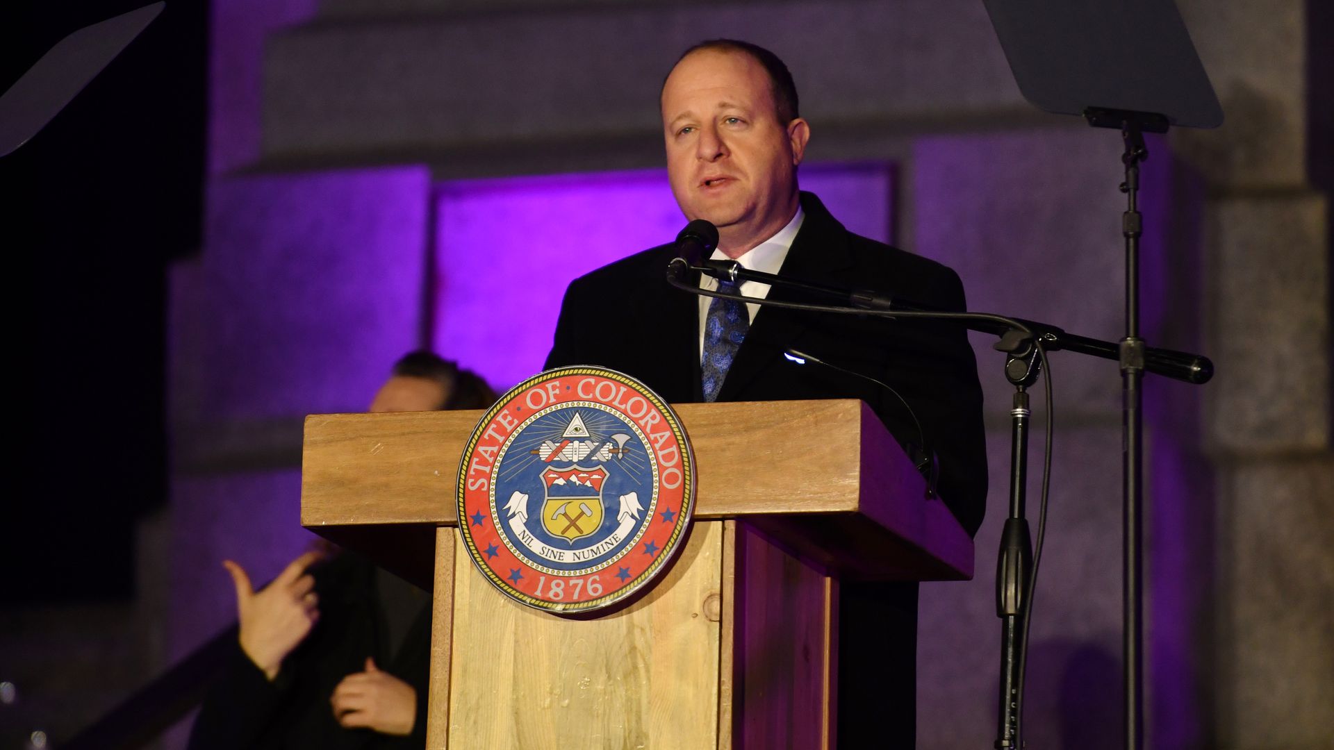 Gov. Jared Polis is in west step of State Capital building for Colorado for Statewide Evening of Remembrance in Denver, Colorado on Friday, March 5, 2021.