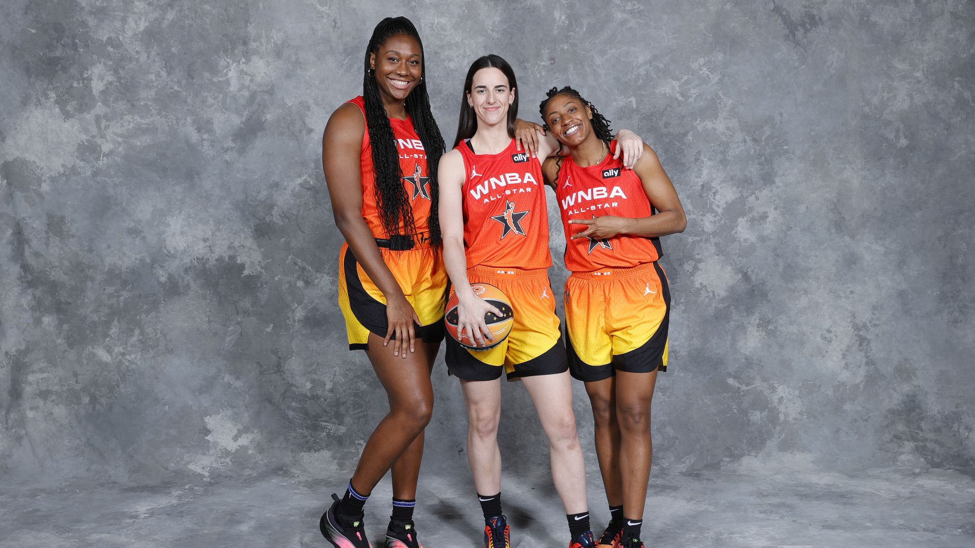 Aliyah Boston #7, Caitlin Clark #22, and Kelsey Mitchell #0 of Team Clark pose for a portrait before the game against Team Collier during the AT&T WNBA All-Star Game 2025 on July 19, 2025 at Gainbridge Fieldhouse in Indianapolis, Indiana.