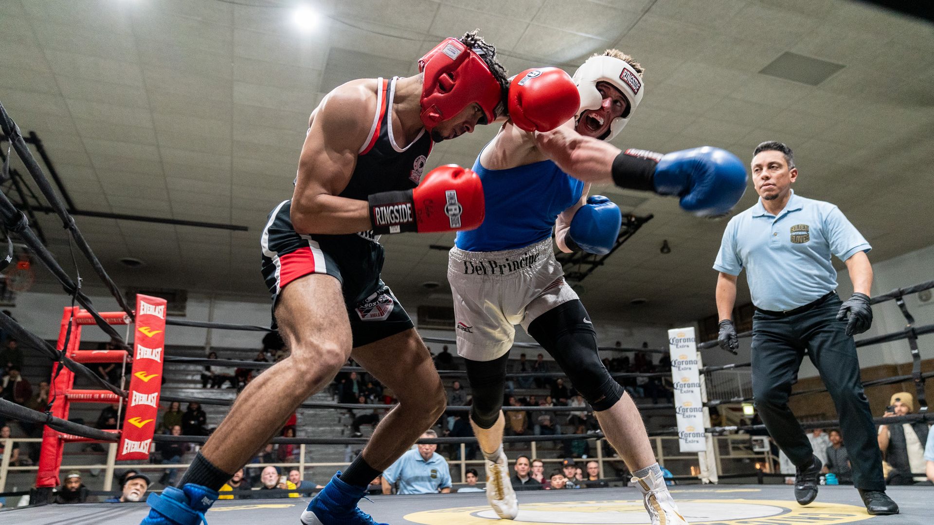 Photo of two boxers in a boxing ring