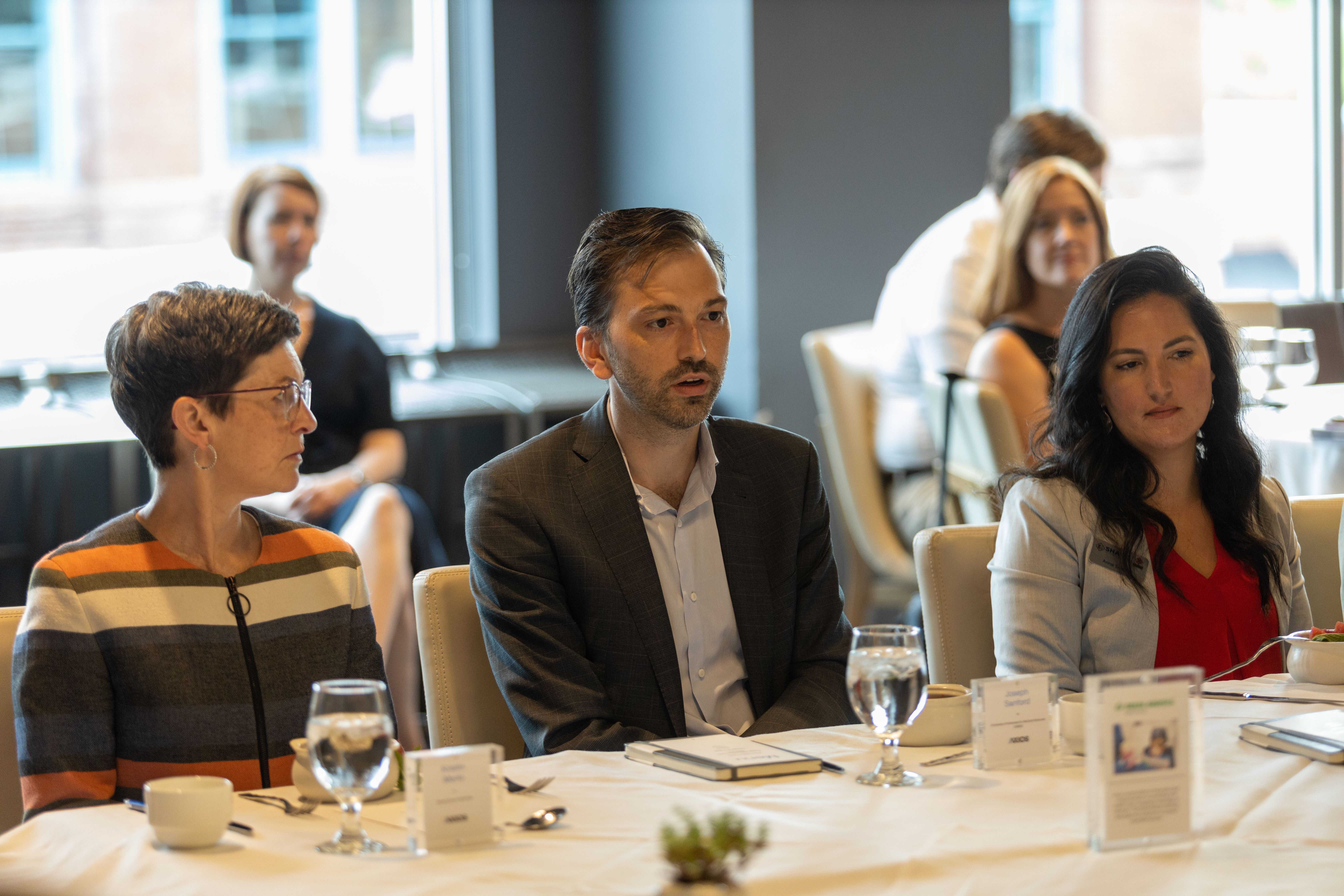 Dr. Joseph Sanford speaking to the Axios roundtable group.