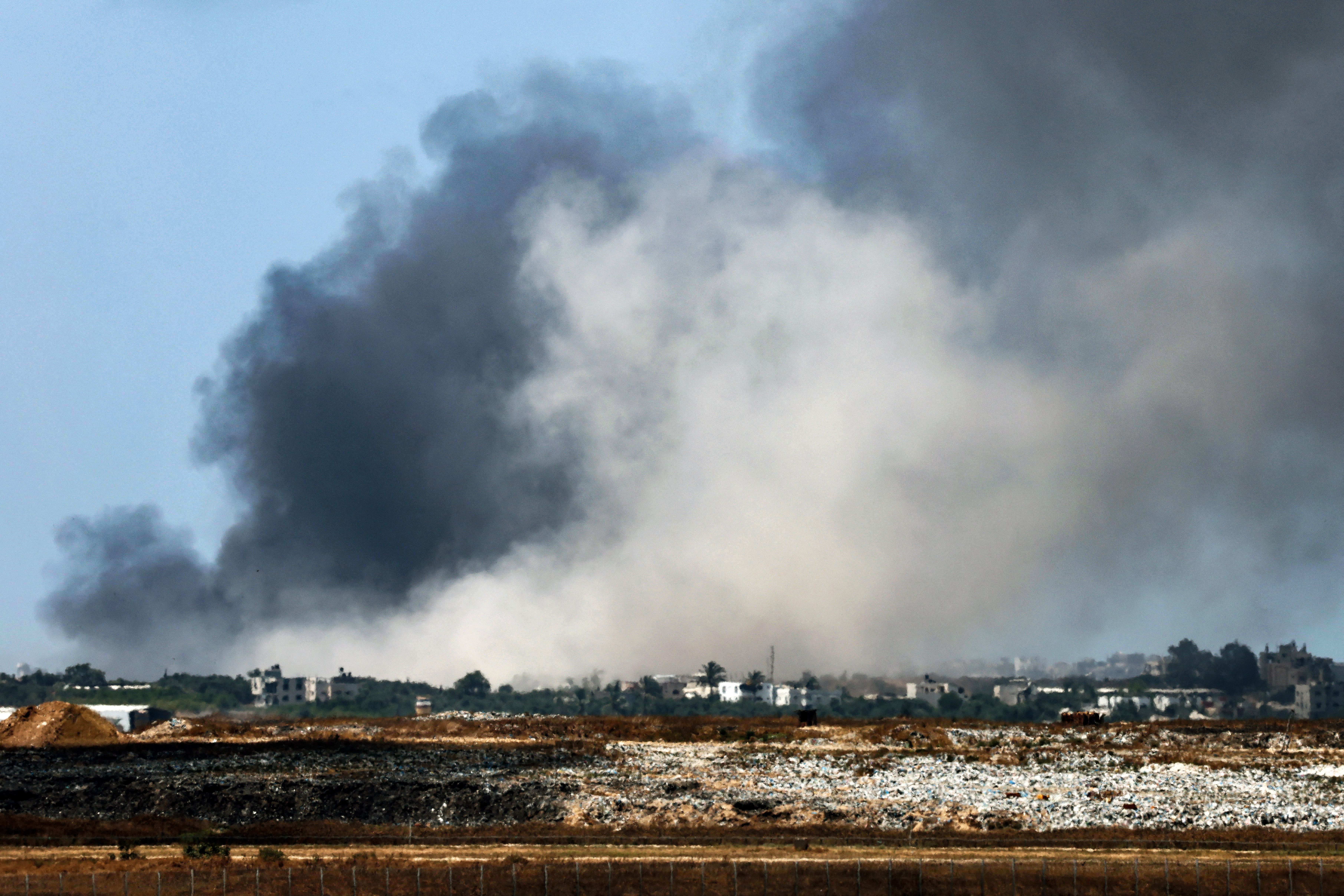 A smoke plume from an explosion in the Gaza Strip is seen from southern Israel yesterday.