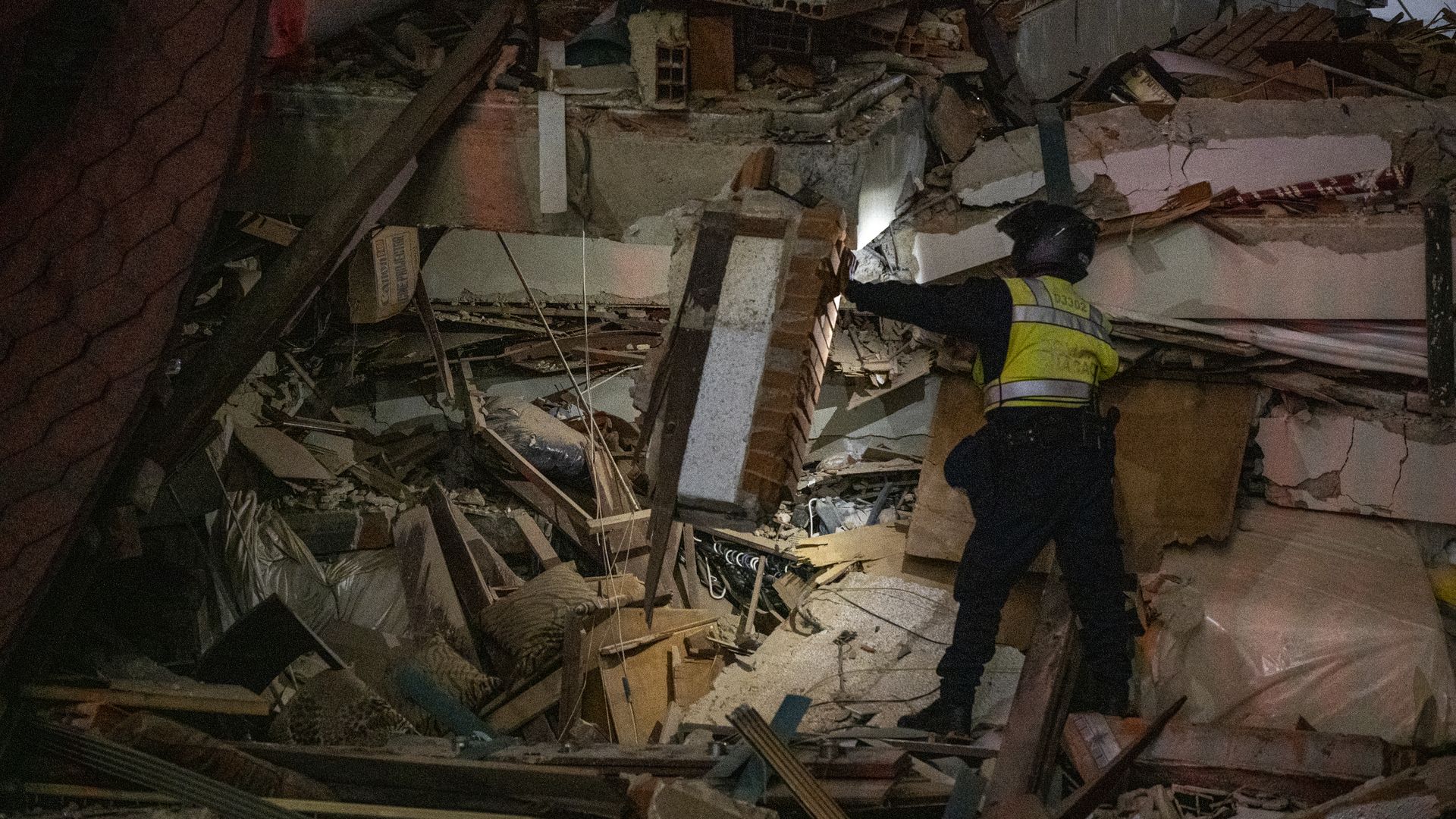 Rescue operations among damaged buildings in Caracas, Venezuela, after two earthquakes struck the region on June 24. Photo by: Jimmy Villalta/VW Pics/Universal Images Group via Getty Images