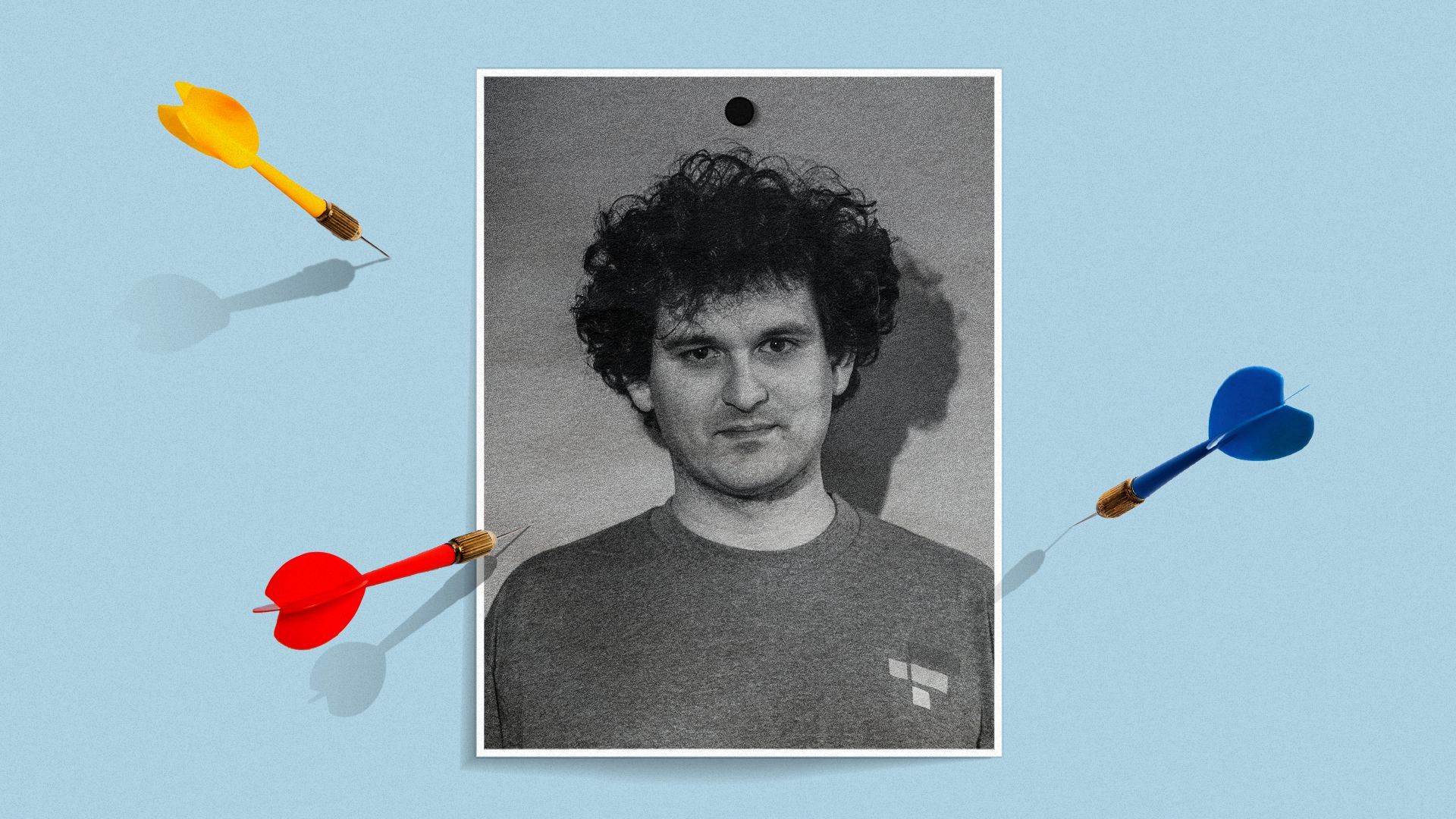 Photo Illustration of a printed photo of SBF surrounded by darts