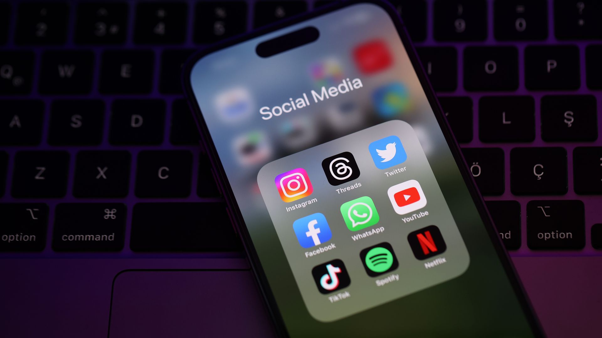 A phone showcasing social media icons.