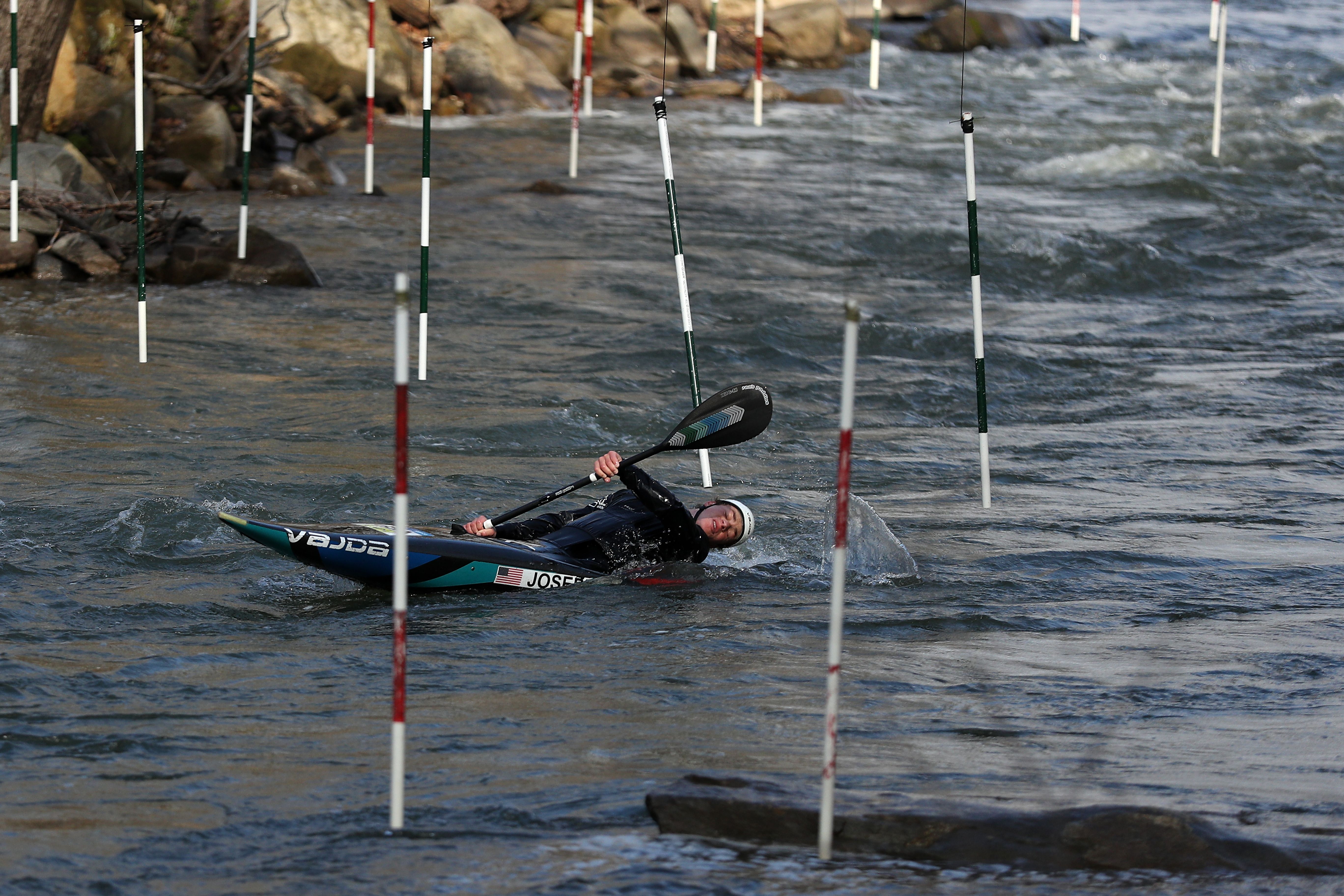 Kayaker practicing in a river