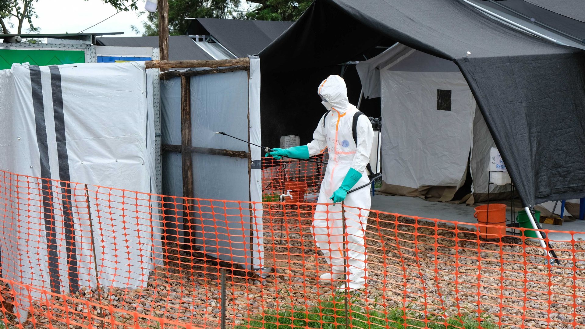 A person disinfecting facilities at an isolation center in Mubende district, Uganda, in November 2022.
