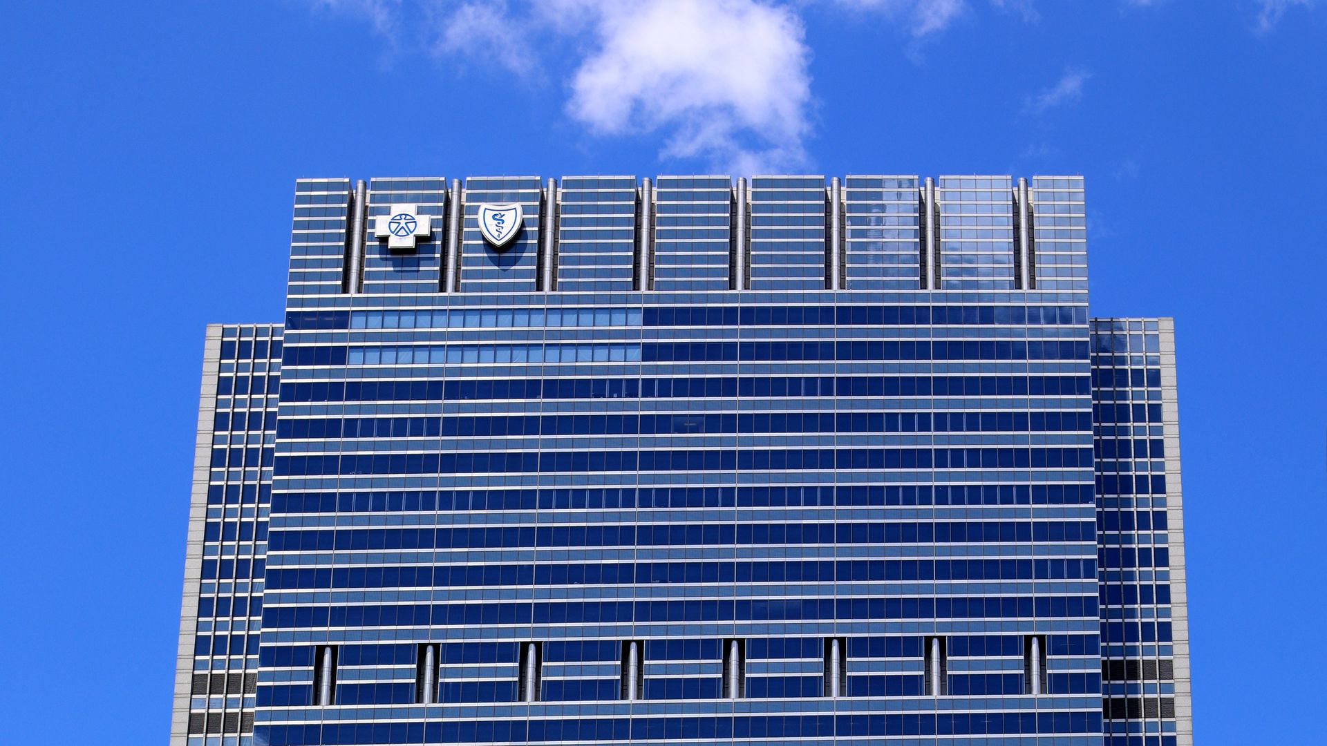 The Blue Cross Blue Shield logo on a building in Chicago.