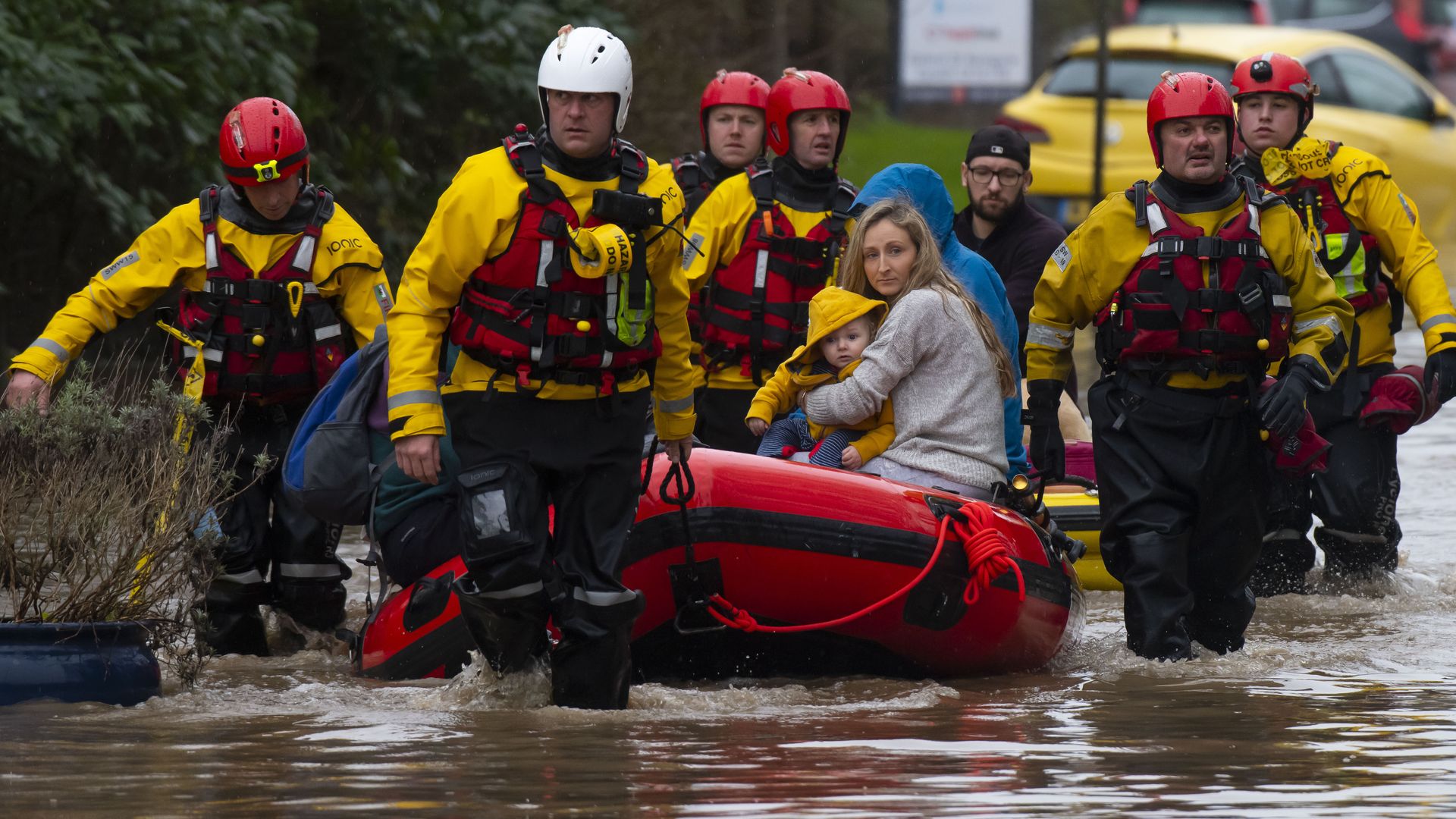 A family is rescued from a property on Oxford Street on February 16, 2020 in Nantgarw, Wales.