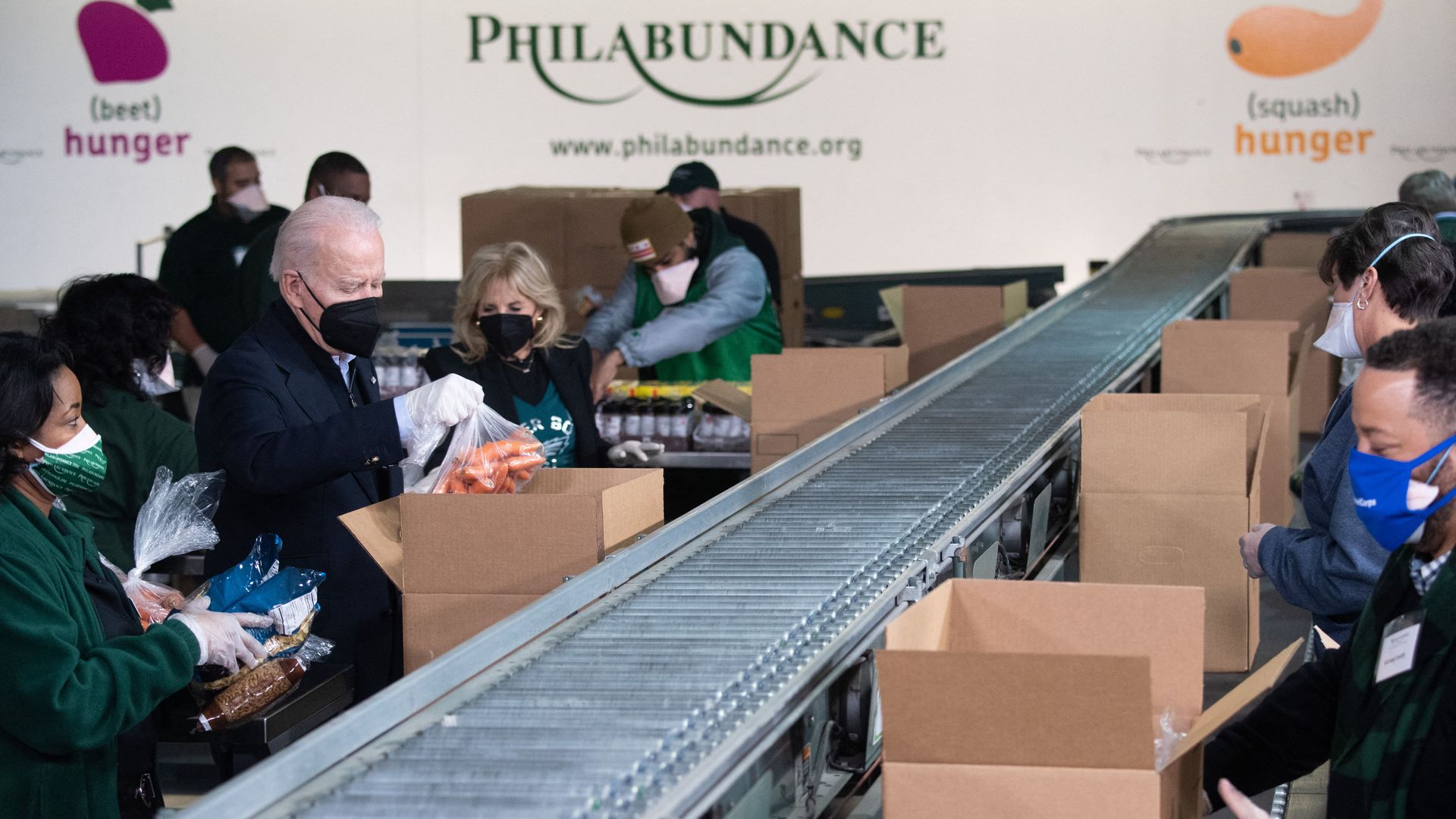 President Biden and first lady Jill Biden are seen packing food boxes to commemorate MLK Jr. Day.