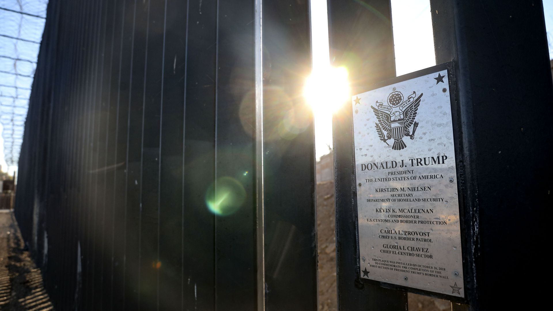 A plaque commemorating President Donald Trumps hangs on the United States-Mexico border wall.