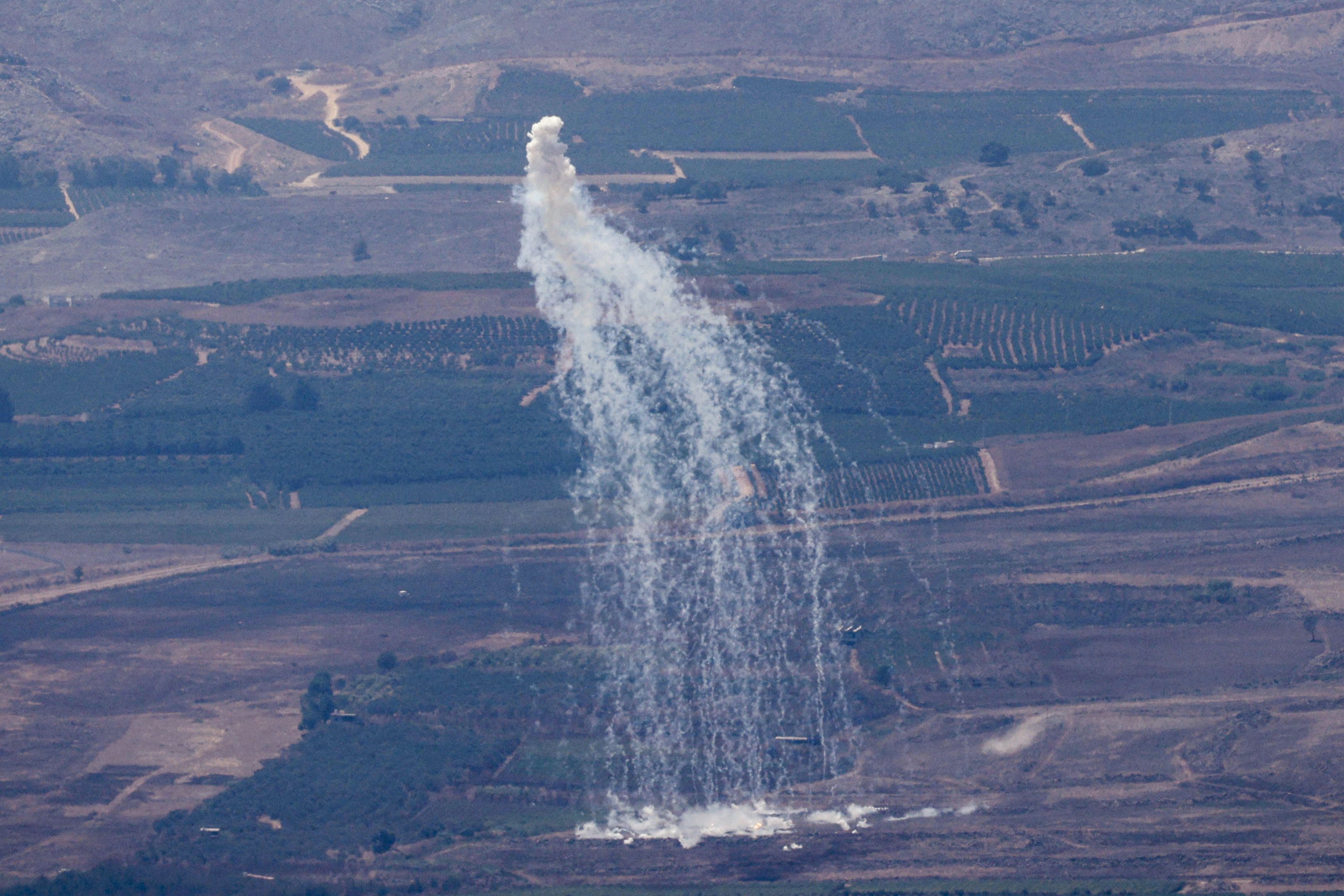Rockets fired from southern Lebanon are intercepted by Israel's Iron Dome defense system in northern Israel last week.