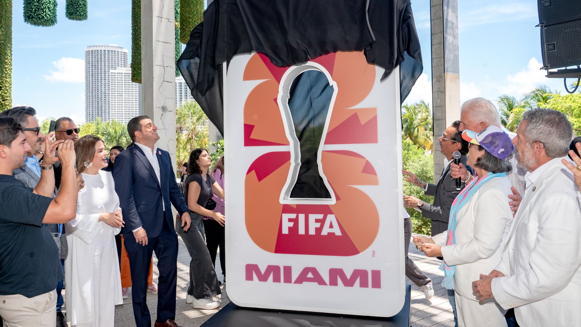 MIAMI, FLORIDA - JUNE 11: Beau Ferrari and Marc Anthony unveil the FIFA World Cup Miami Countdown Clock during the FIFA World Cup One Year Out Celebration at Perez Art Museum Miami on June 11, 2025 in Miami, Florida. (Photo by Ivan Apfel/Getty Images)