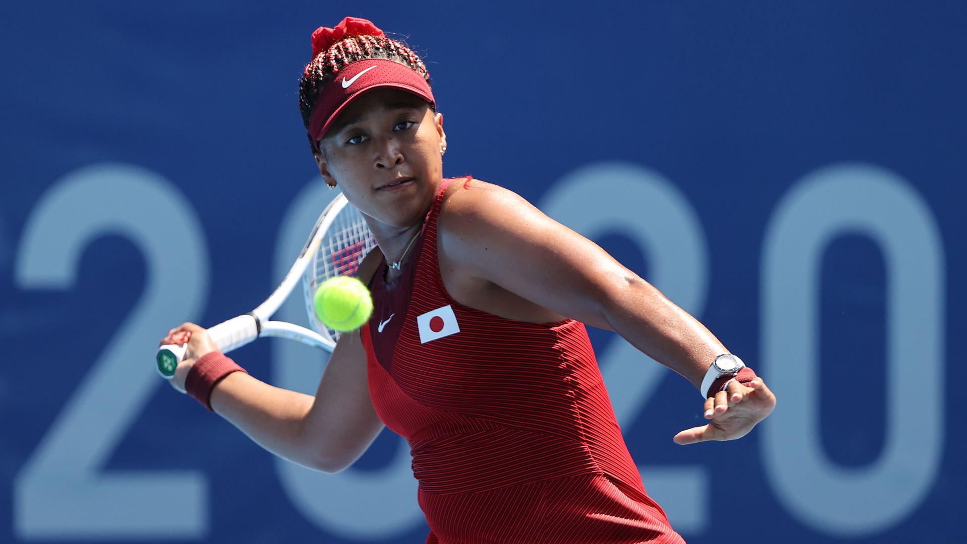 Naomi Osaka during her Women's Singles First Round match against Saisai Zheng of Team China on day two of the Tokyo 2020 Olympic Games