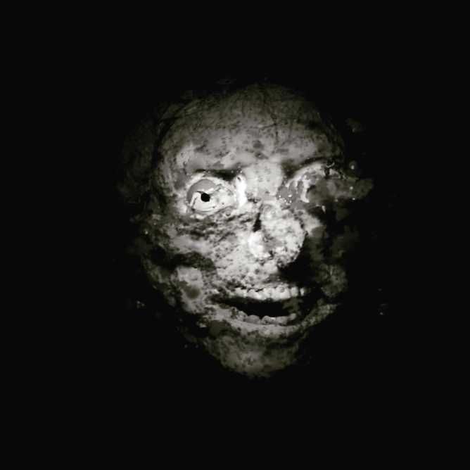 Photo of a muddy puppet face 