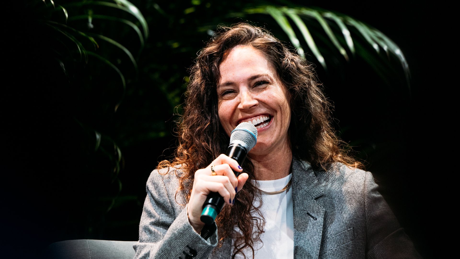 NEW YORK, NEW YORK - APRIL 23: Sue Bird looks on as a partnership with iHeart Media is announced during the Business of Women Sport Summit presented by Deep Blue Sports and Axios at Chelsea Factory on April 23, 2024 in New York City. (Photo by Elsa/Getty Images)