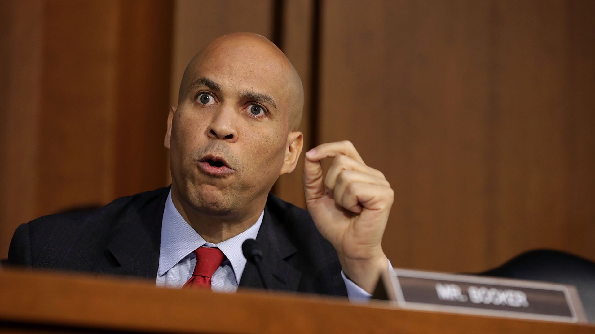 Sen. Cory Booker speaking angrily in a hearing