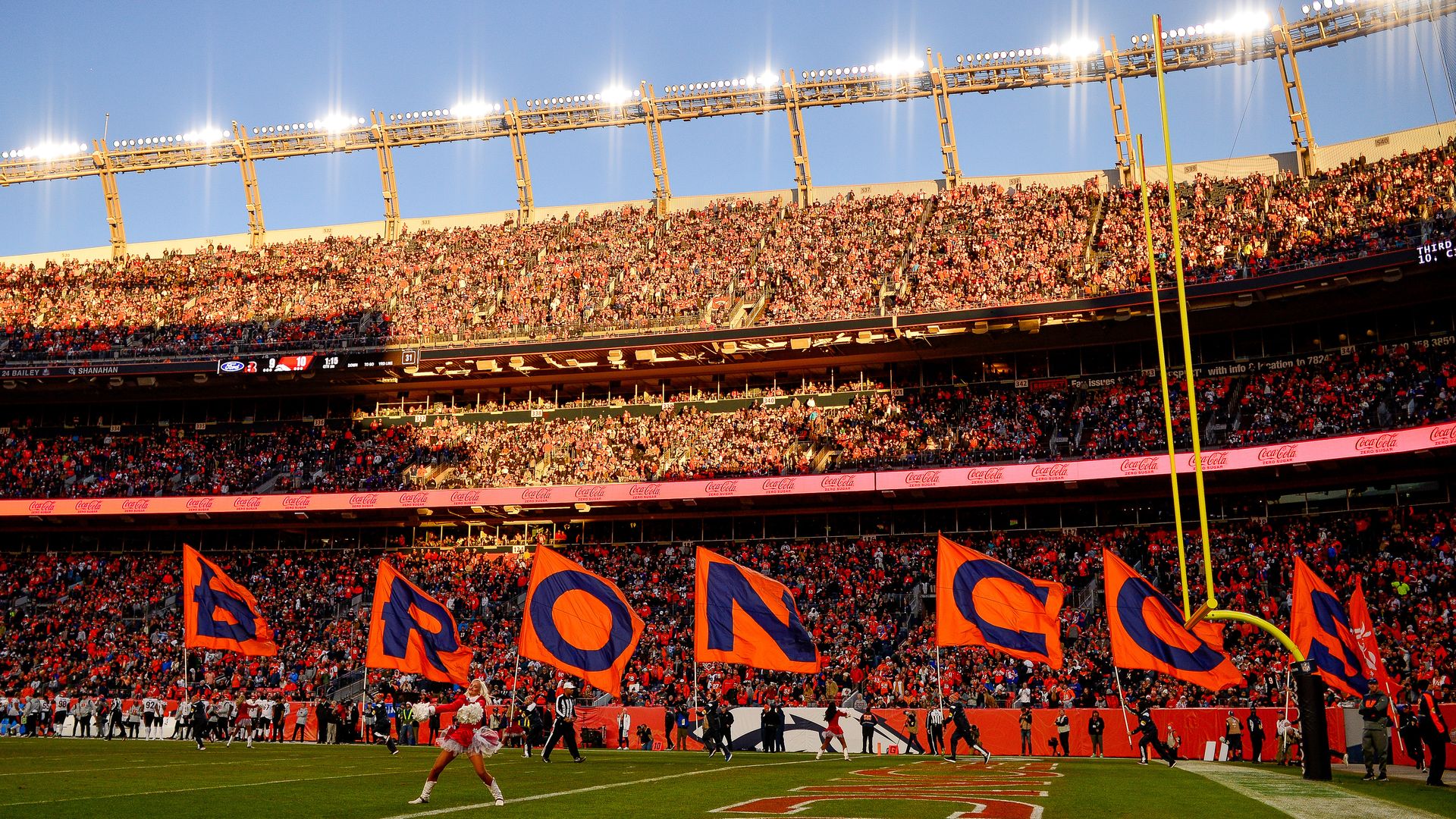 Denver Broncos agree to record sale to Walton-Penner family