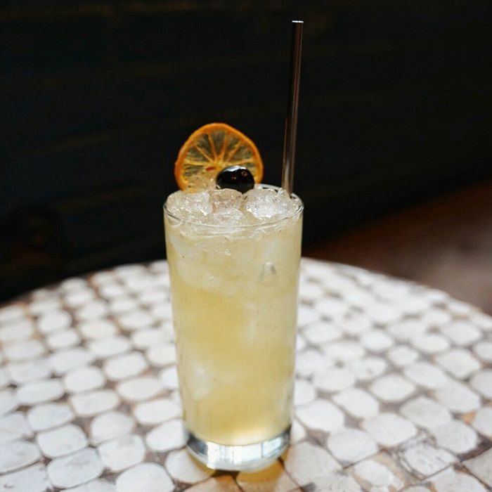Henry Collins cocktail with carbonated vodka and charred lemon. Photo courtesy of Humbug