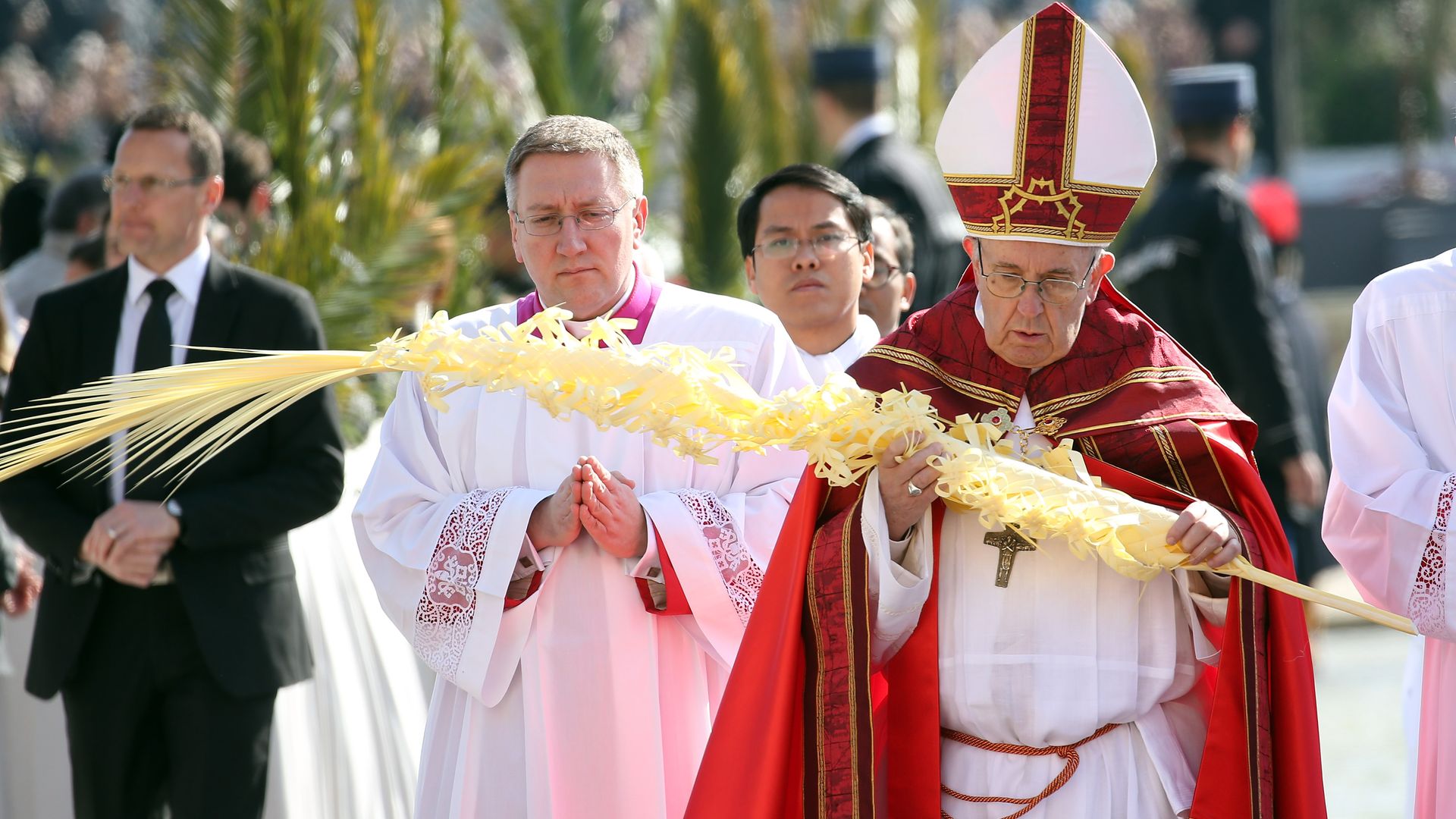 Pope Francis arrives in procession at St. Peter's Square during the Palm Sunday Mass