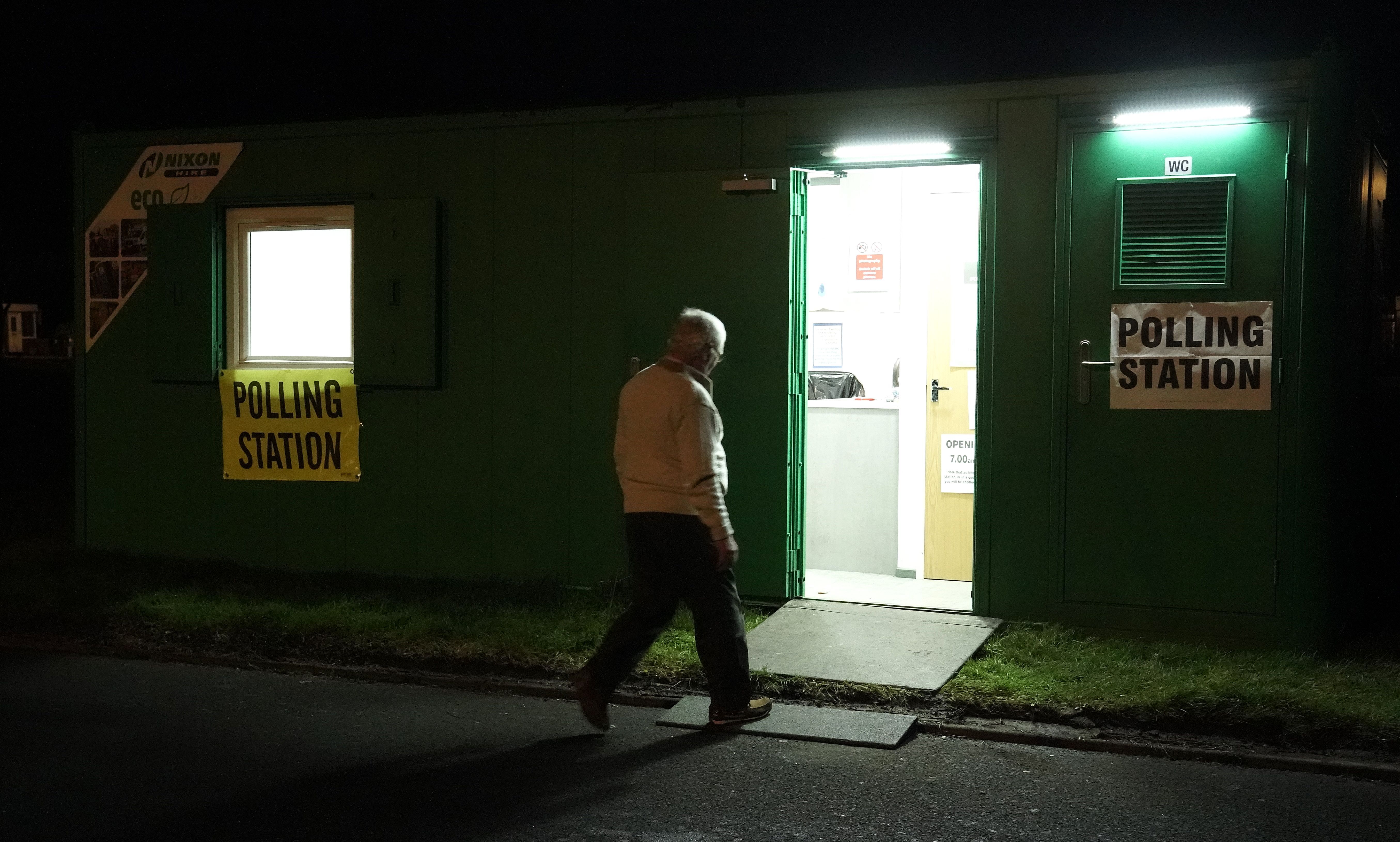 An early voter at a polling station in Whitley Bay, northeast England. 