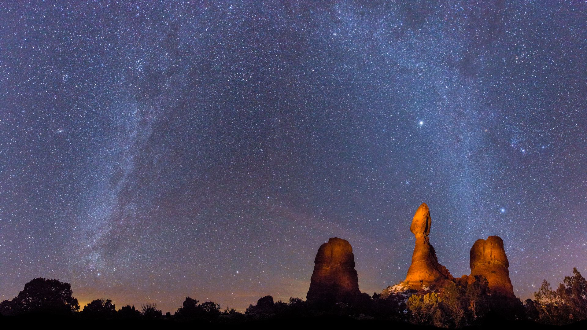 The Milky Way over Balanced Rock in Arches National Park, Moab, Utah, USA. (Photo by: Jon G. Fuller/VWPics/Universal Images Group via Getty Images)