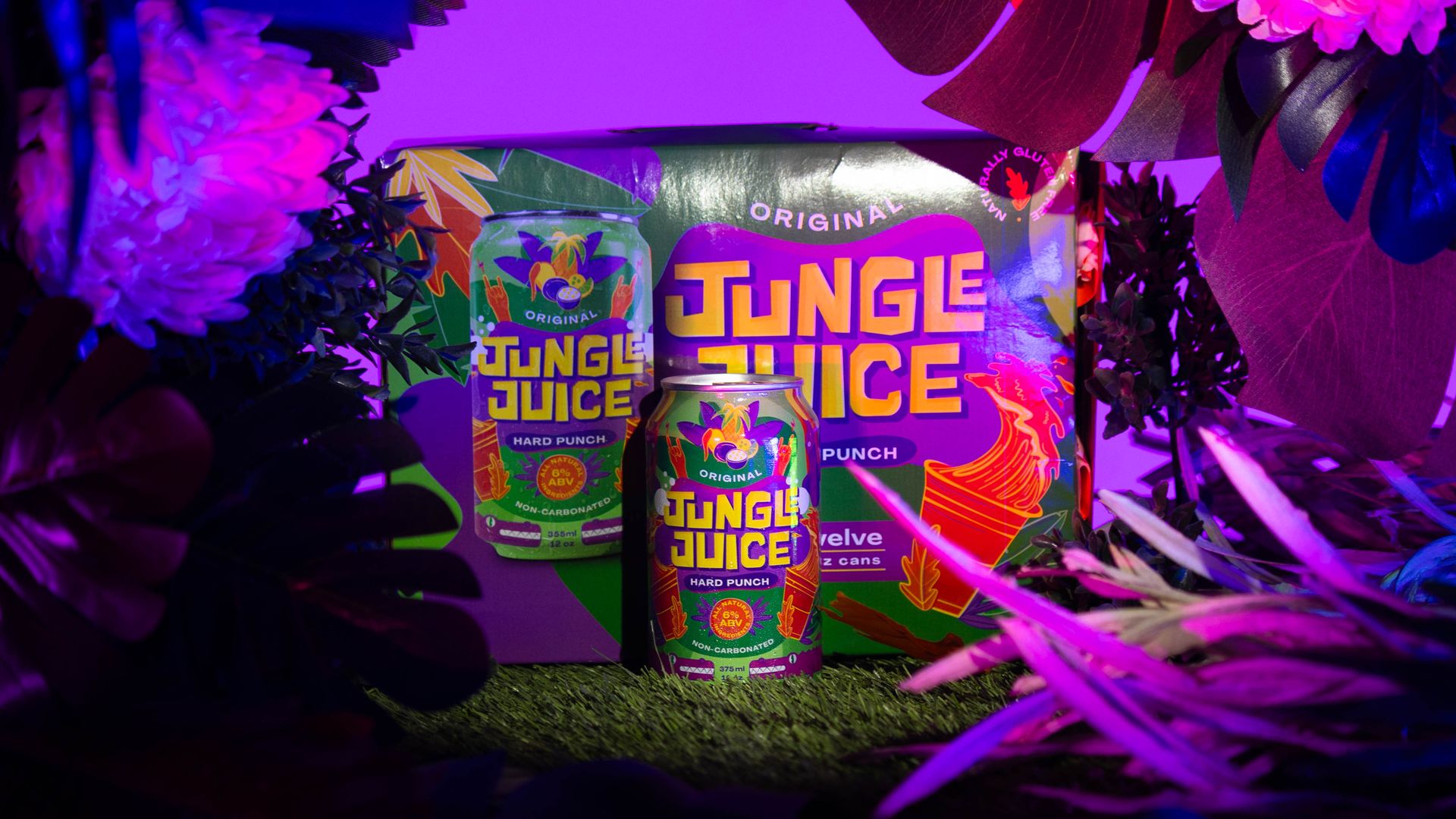 A can of "Jungle Juice" in front of a branded package of the same product, in purple light. 