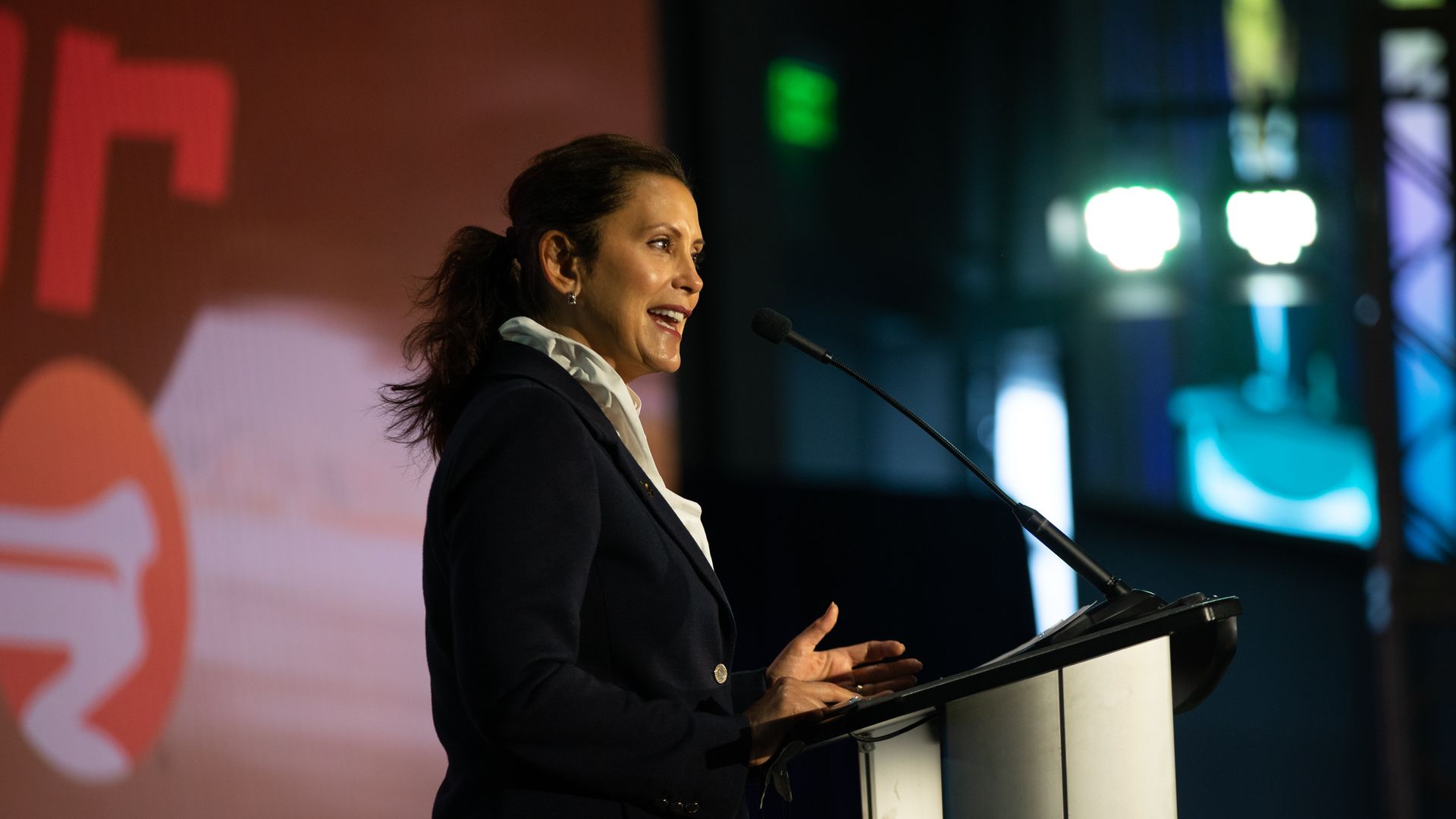 Photo of Gretchen Whitmer speaking from a podium