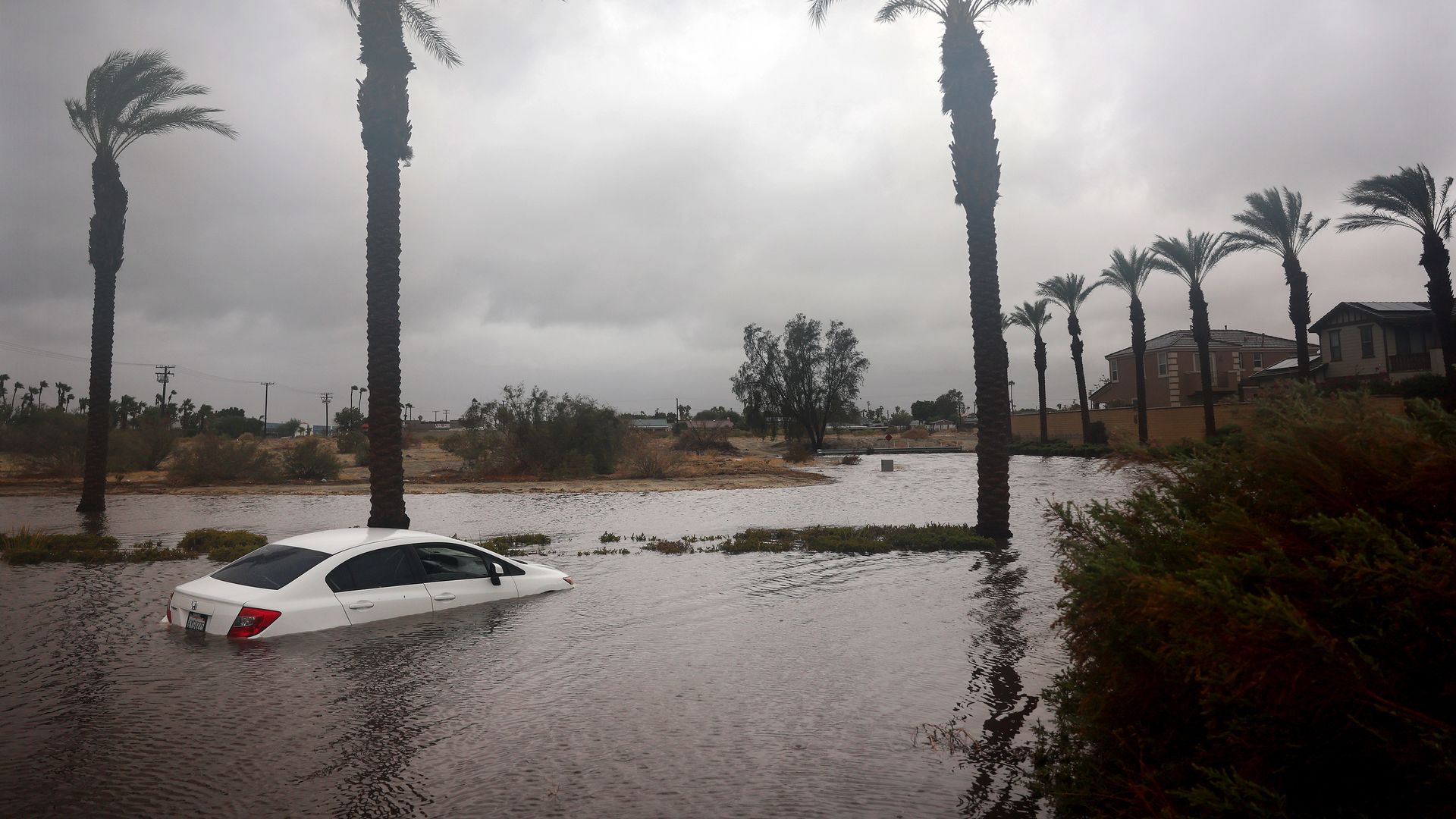 Car in floodwaters from Tropical Storm Hilary on August 20.