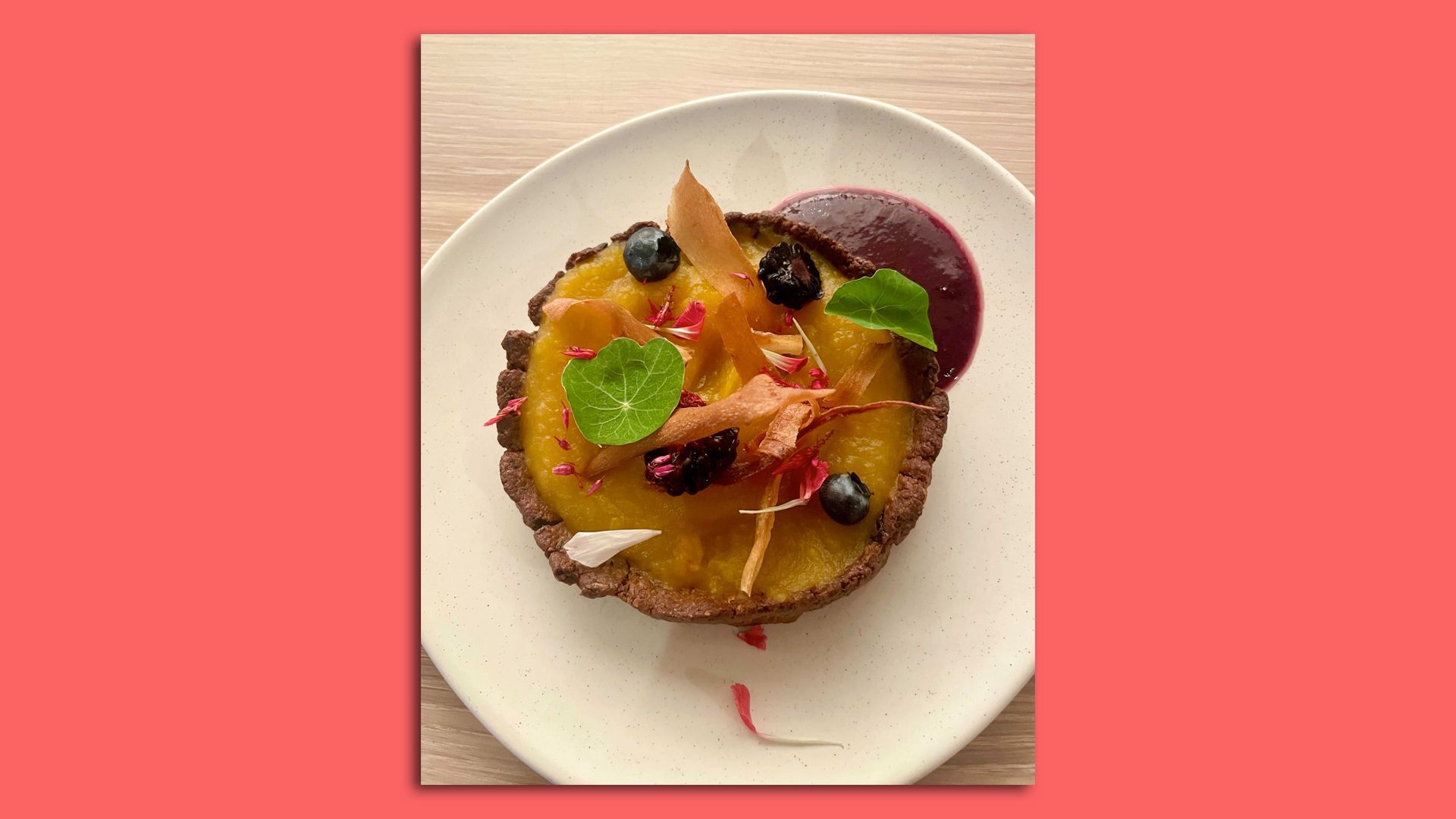 A photo of a colorful garden squash tart.