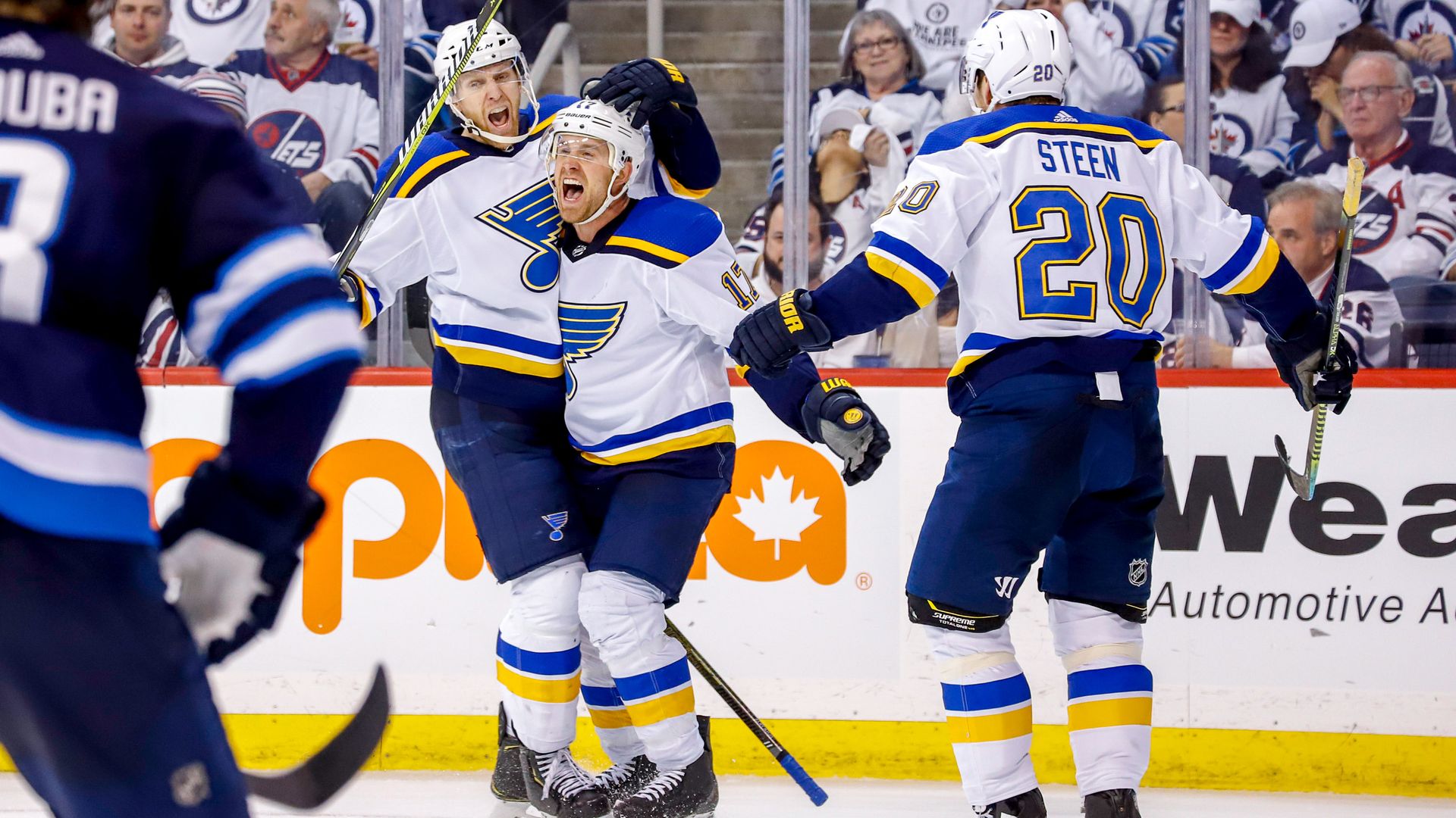Blues players celebrate the game-winning goal