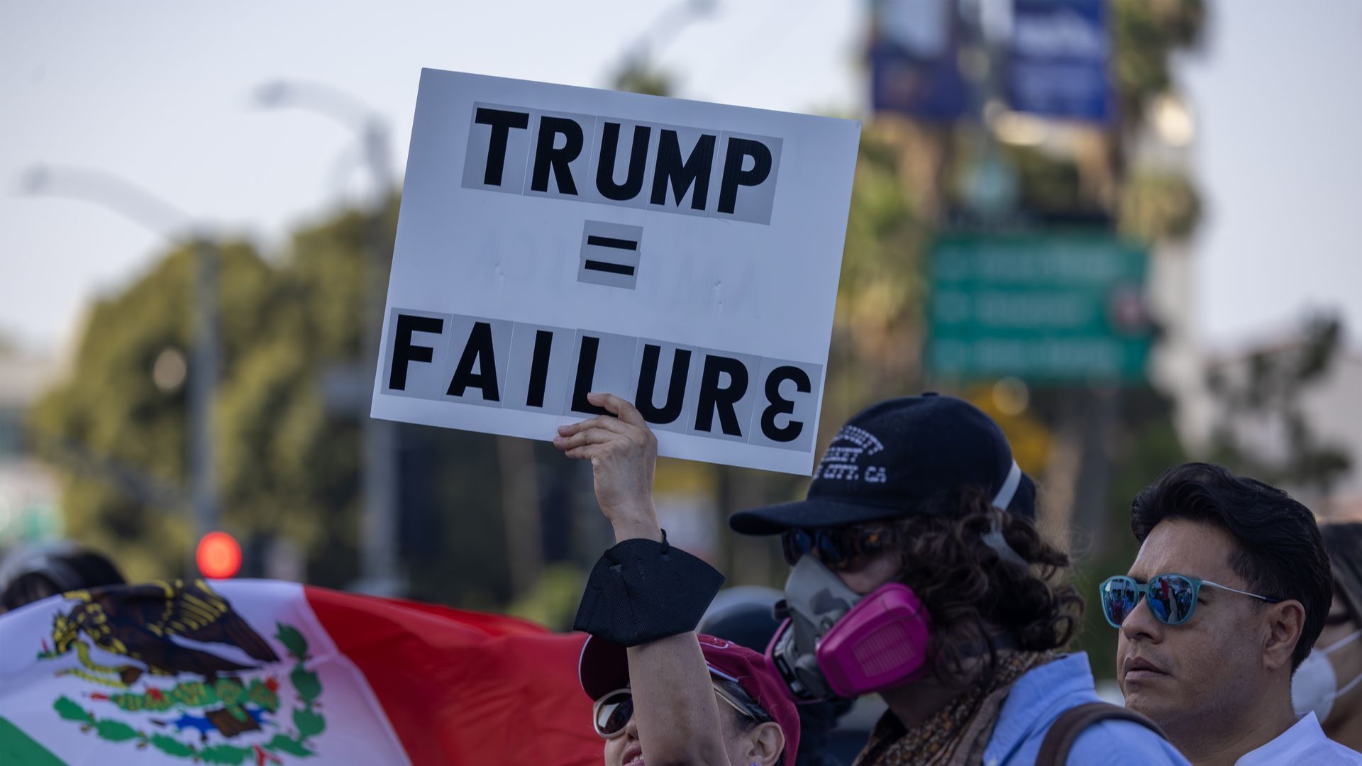People protest in downtown Los Angeles in response to immigration raids in June 2025. 