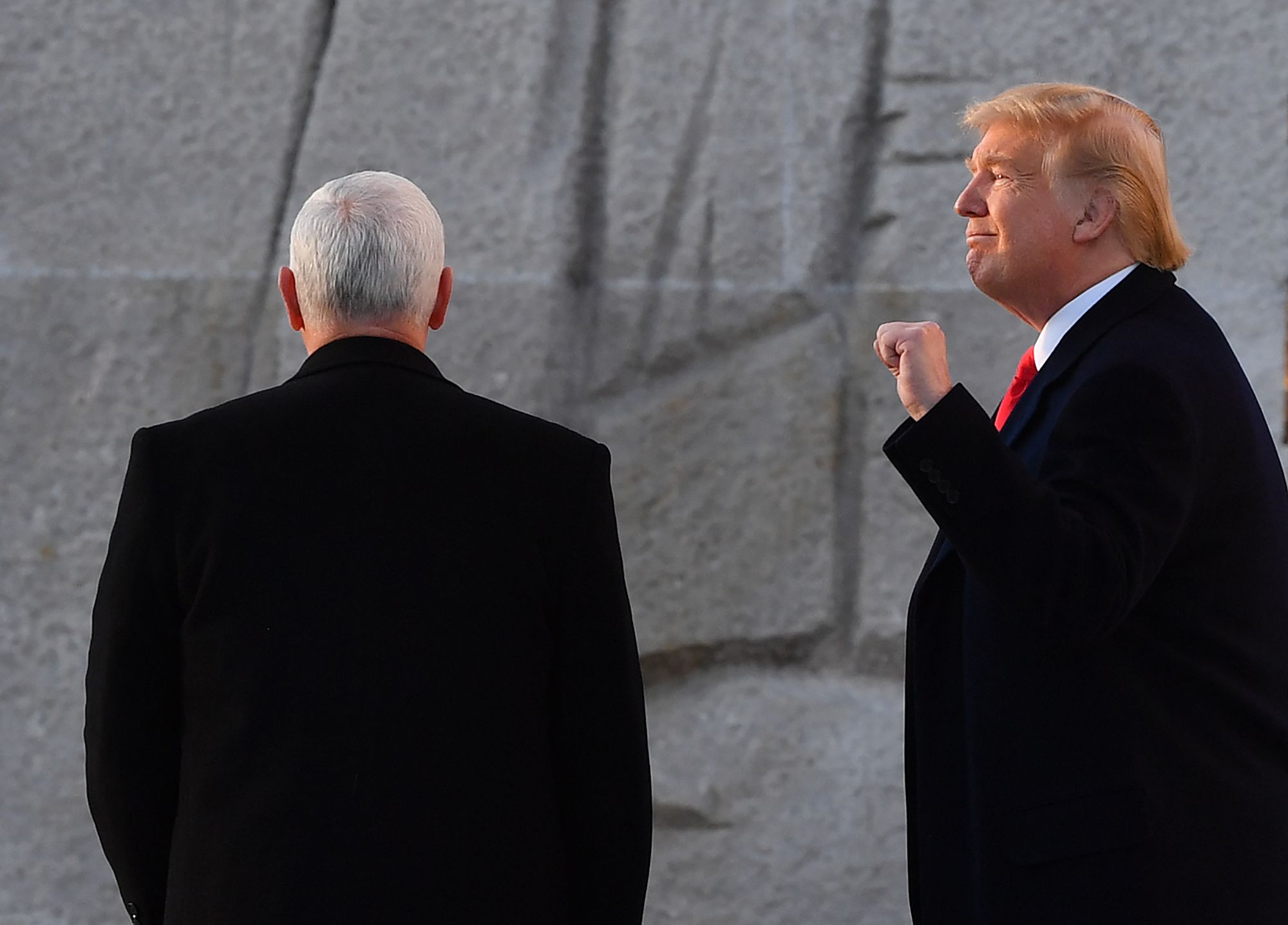 President Donald Trump and US Vice President Mike Pence arrive at the Martin Luther King Jr. memorial on MLK day in Washington, DC