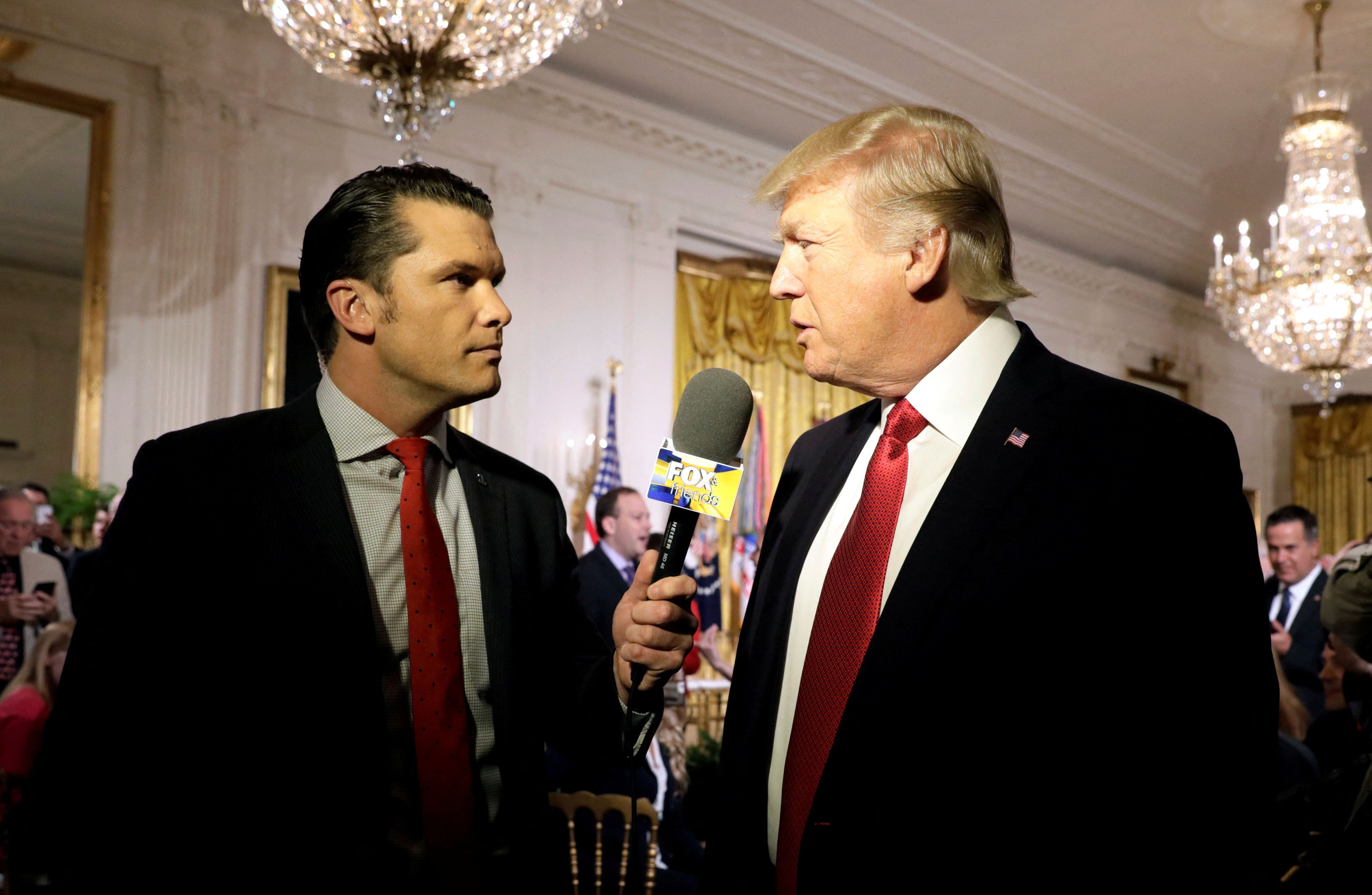 Pete Hegseth interviews President Trump at the White House in 2017. Photo: Kevin Lamarque/Reuters