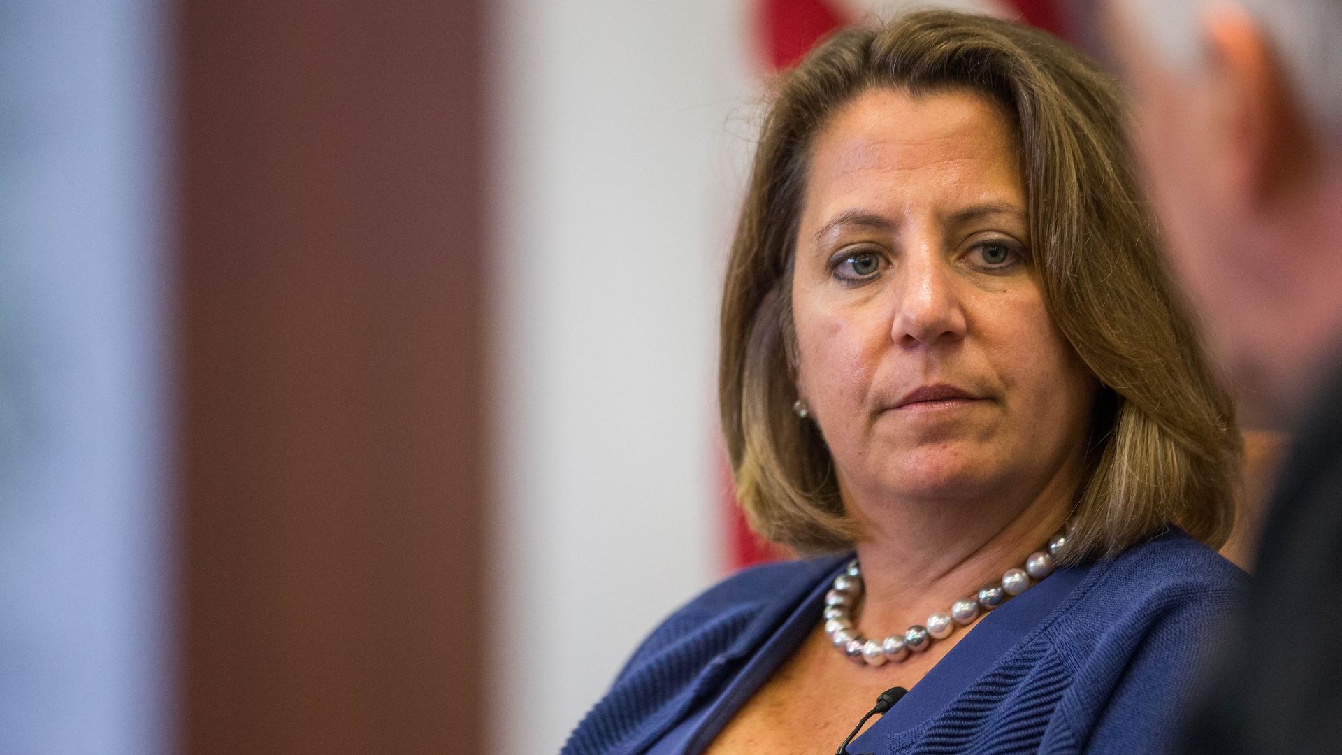 Lisa Monaco on stage at an interview. 