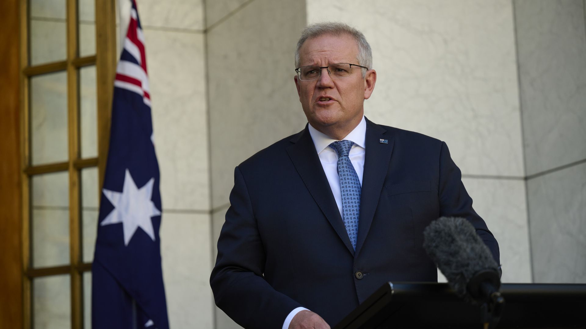 Australian Prime Minister Scott Morrison announces a plan to 'live with the virus' during a press conference at Parliament House