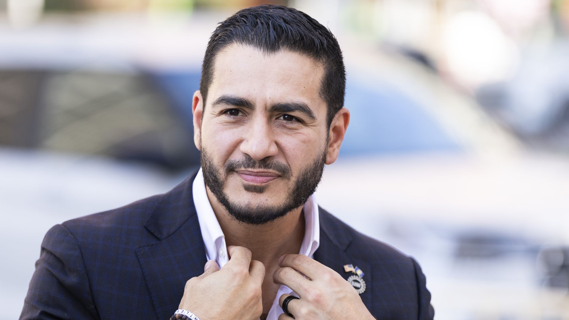 Abdul El-Sayed arrives at a press conference in front of the Spirit of Detroit statue on Aug. 5 in Detroit.