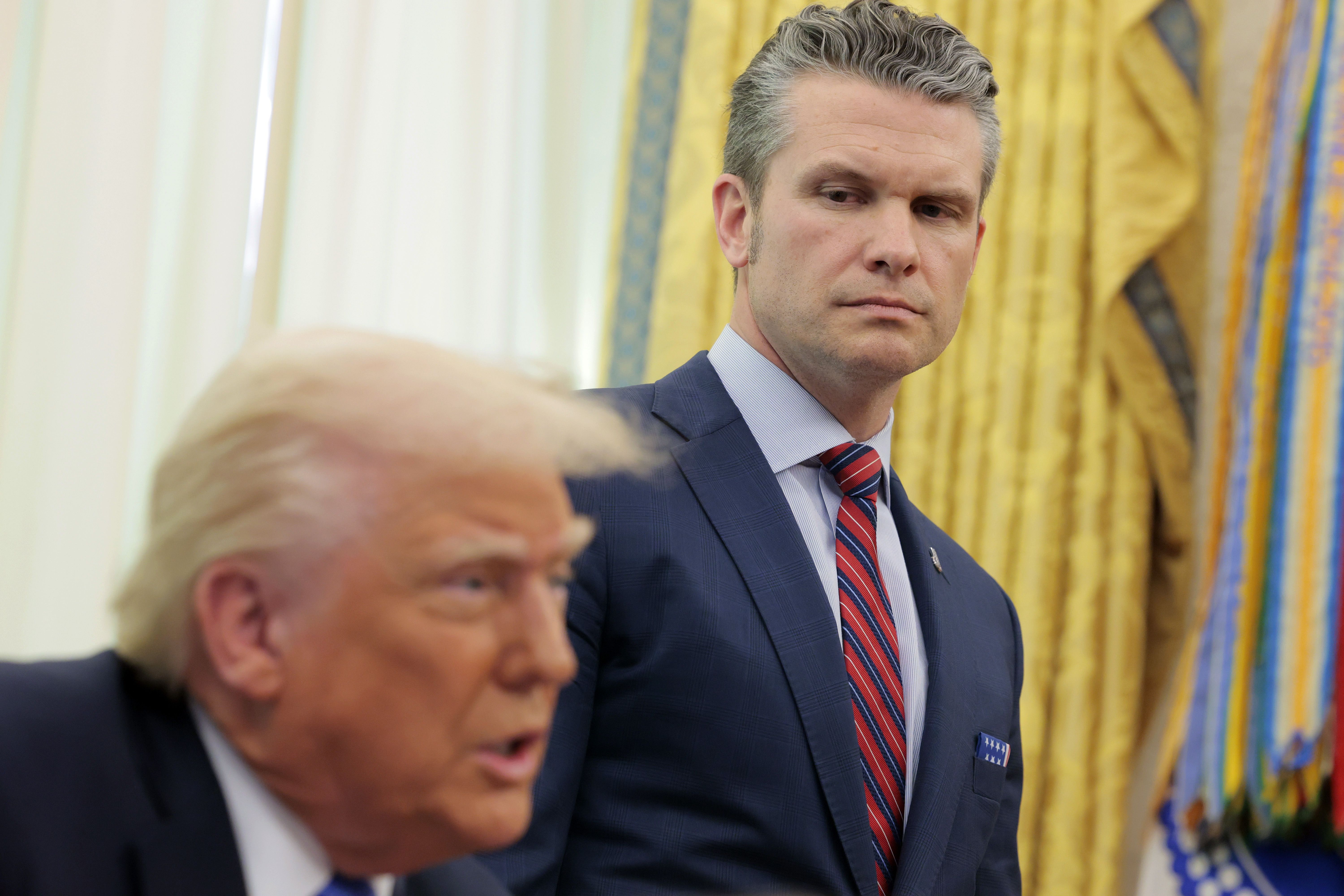  U.S. Secretary of Defense Pete Hegseth listens as U.S. President Donald Trump delivers remarks in the Oval Office of the White House on March 21, 2025 in Washington, DC. Trump announced the Next Generation of Air Dominance (NGDA) program, the F-47, the sixth-generation high-tech Air Force fighter t
