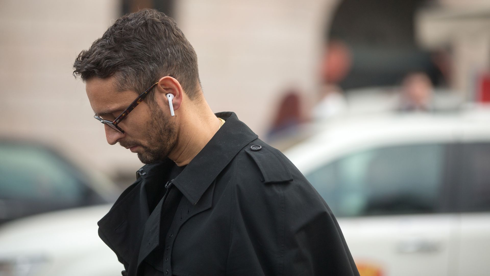 Photo of a man wearing AirPods