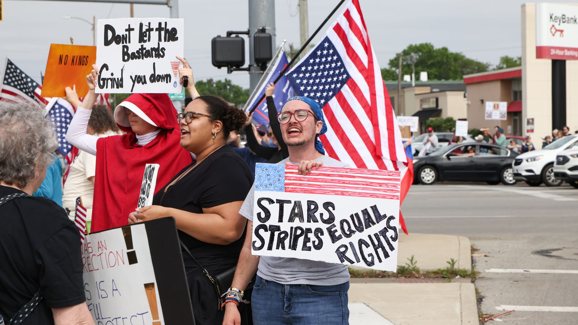 Protesters gather to demonstrate in support of the "No Kings" movement.