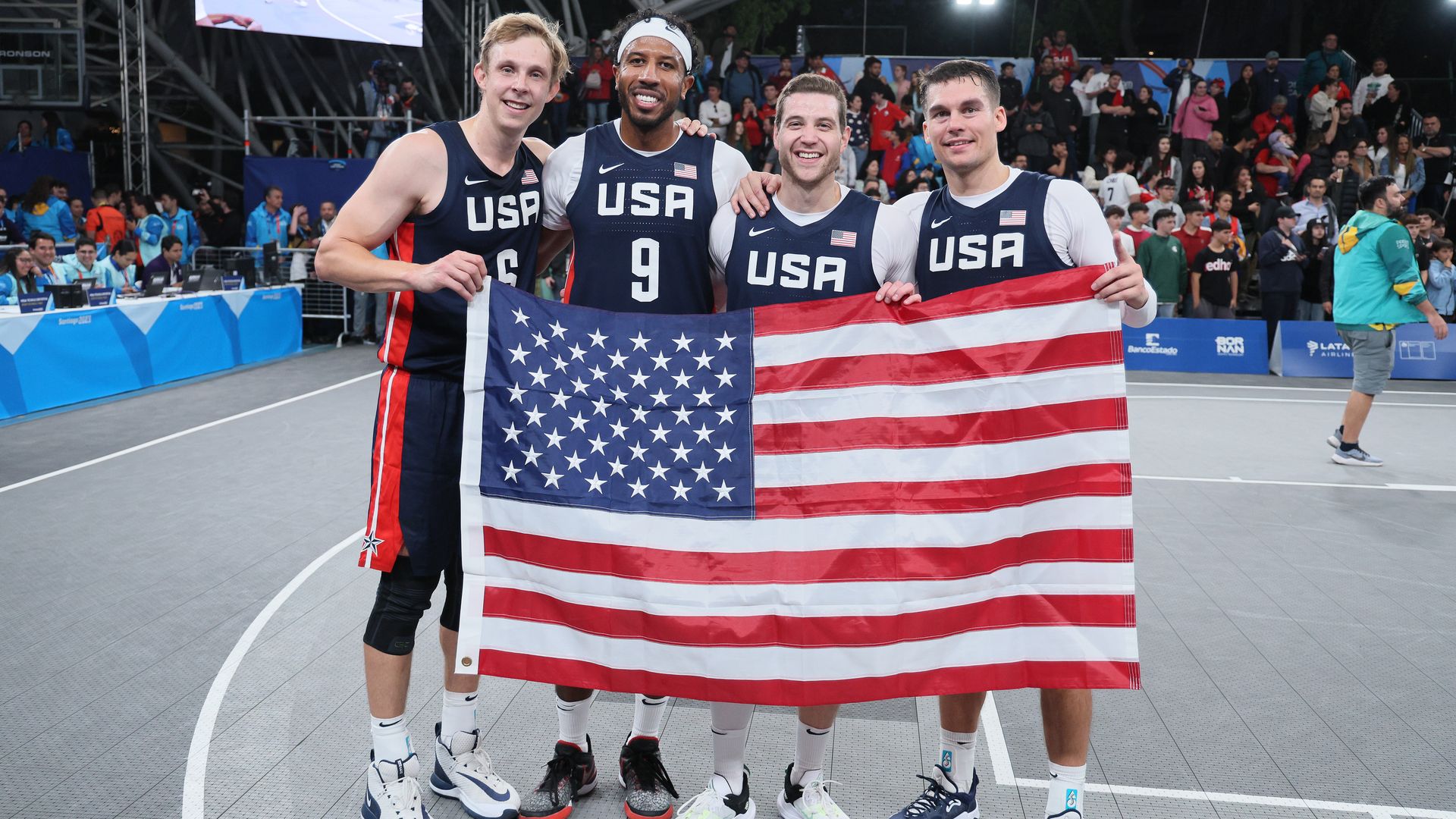 From left, Canyon Barry, Dylan Travis, Jimmer Fredette and Kareem Maddox of Team USA after winning the Gold Medal in Men's Basketball 3x3 at the Santiago 2023 Pan Am Games in Chile. Photo: Andy Lyons/Getty Images
