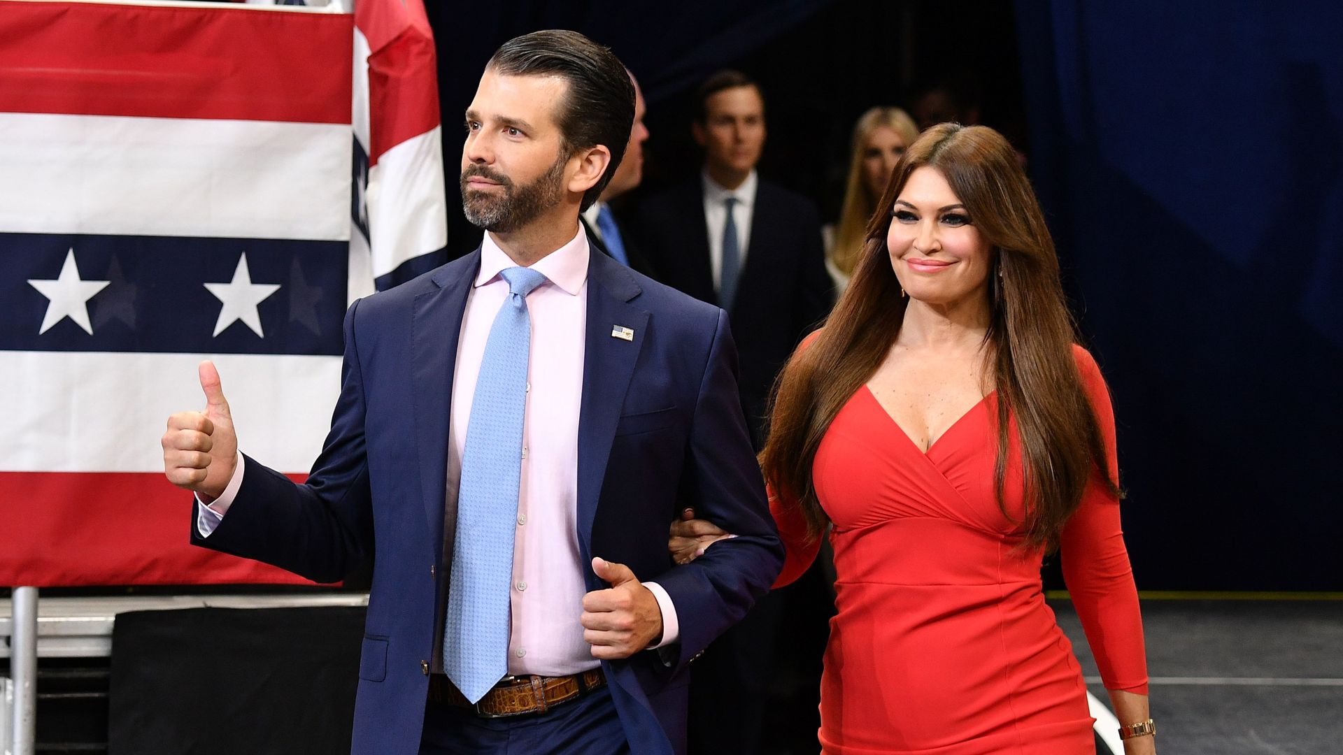 Kimberly Guilfoyle and Donald Trump Jr. arrive at a rally for President Trump