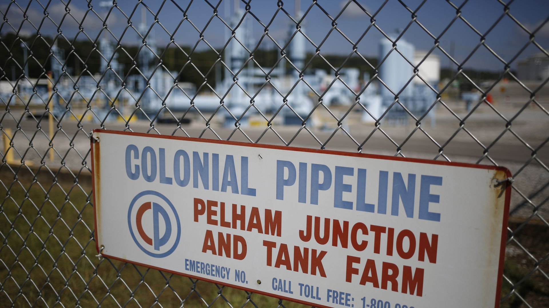 Signage is displayed on a fence at the Colonial Pipeline Co. Pelham junction and tank farm in Pelham, Alabama, U.S., on Monday, Sept. 19, 2016. 