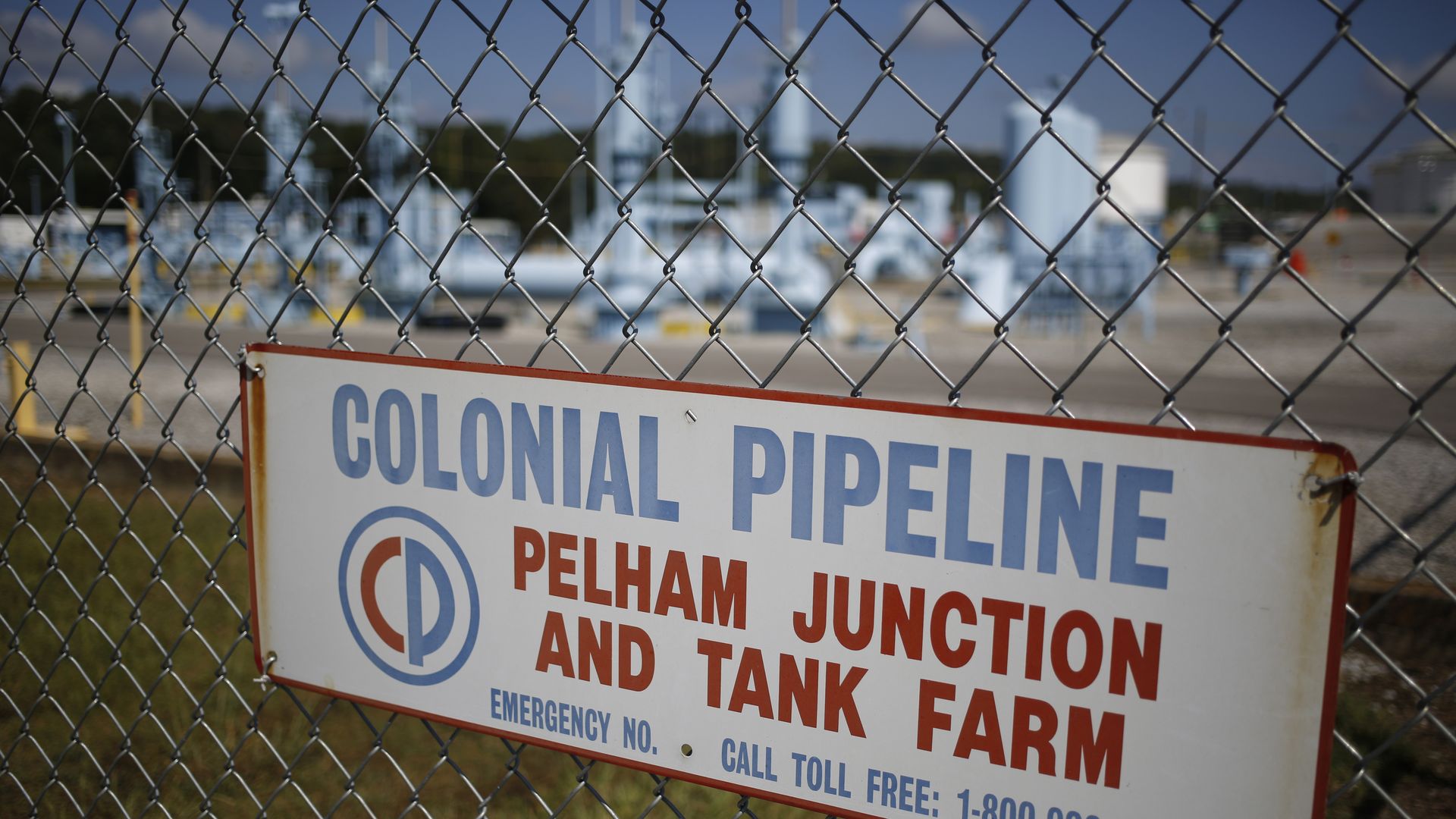 Signage is displayed on a fence at the Colonial Pipeline Co. Pelham junction and tank farm in Pelham, Alabama, U.S., on Monday, Sept. 19, 2016.