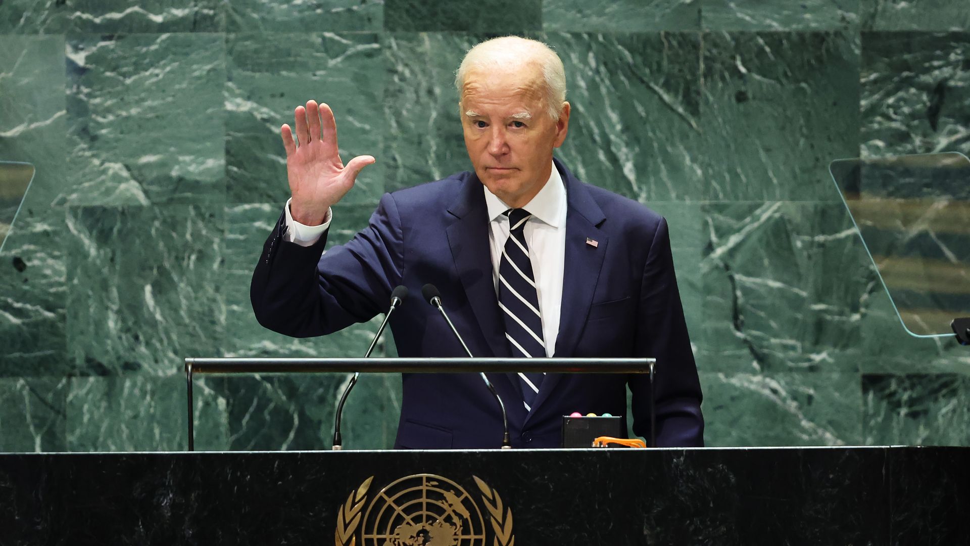 Biden waves