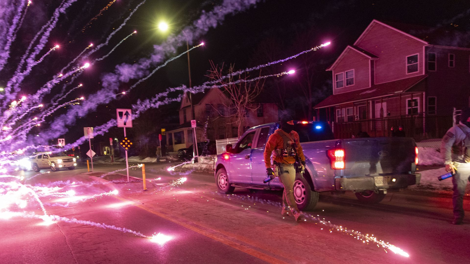 Federal agents deploying tear gas and pepper balls against protesters in north Minneapolis amid demonstrations over the fatal ICE shooting of Renee Nicole Good.