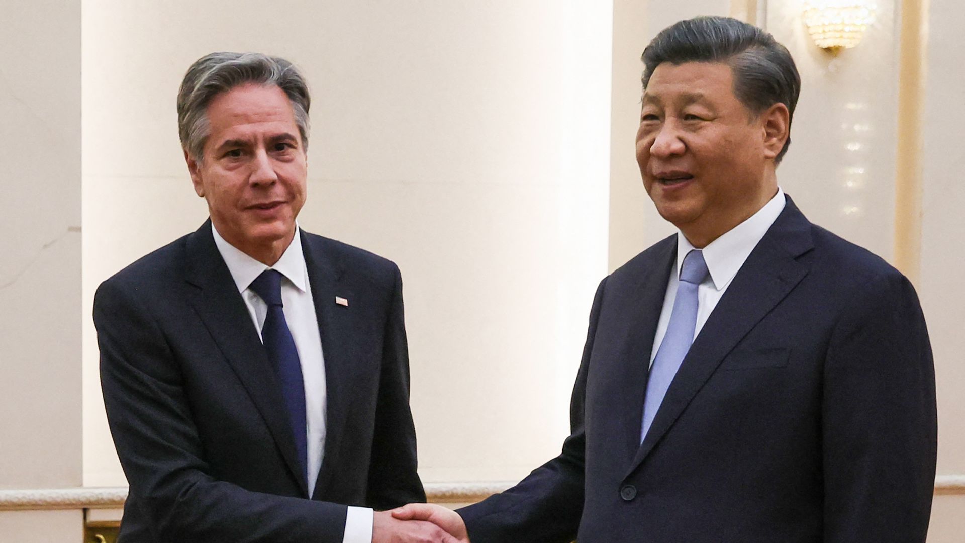 US Secretary of State Antony Blinken (L) shakes hands with China's President Xi Jinping at the Great Hall of the People in Beijing on June 19, 2023. 