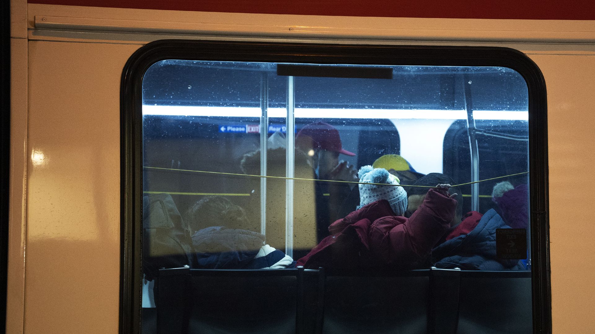 A child is seen through a bus window in Philadelphia.