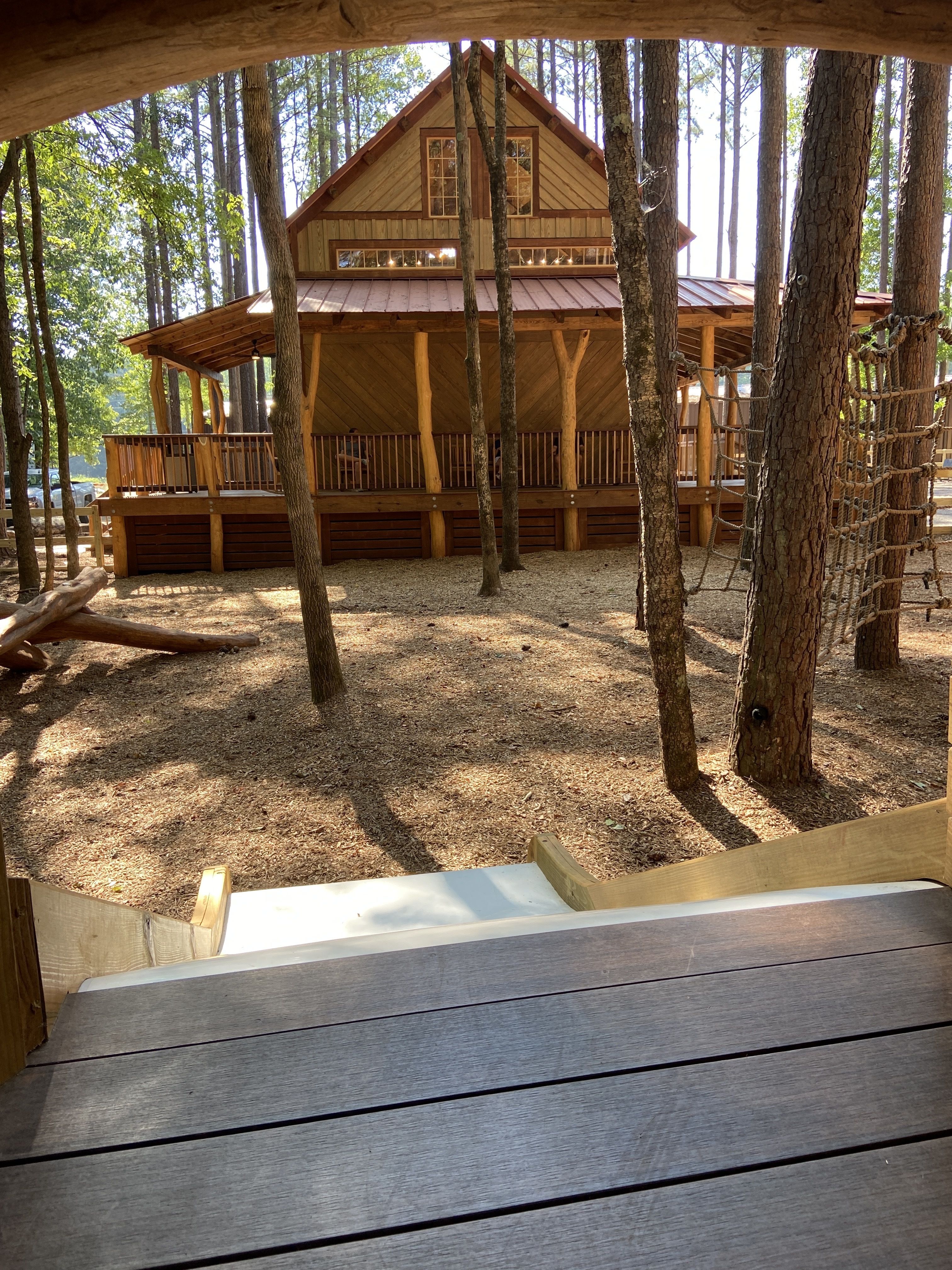 View of the cabin from one of the treehouses in Wildwoods. 