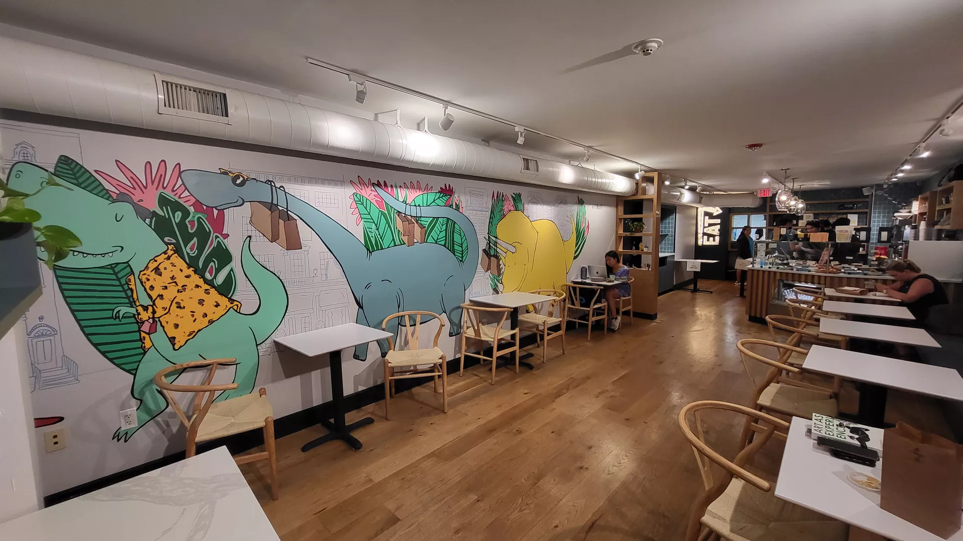 Tables and chairs inside Revival Cafe