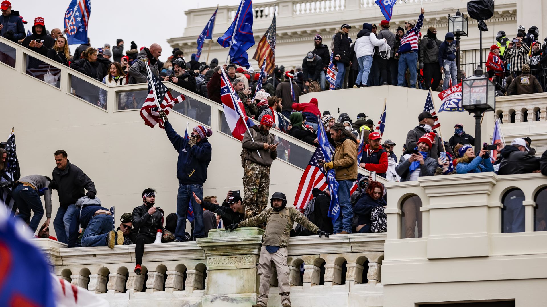 Jan. 6 rioters on the steps of the Capitol.